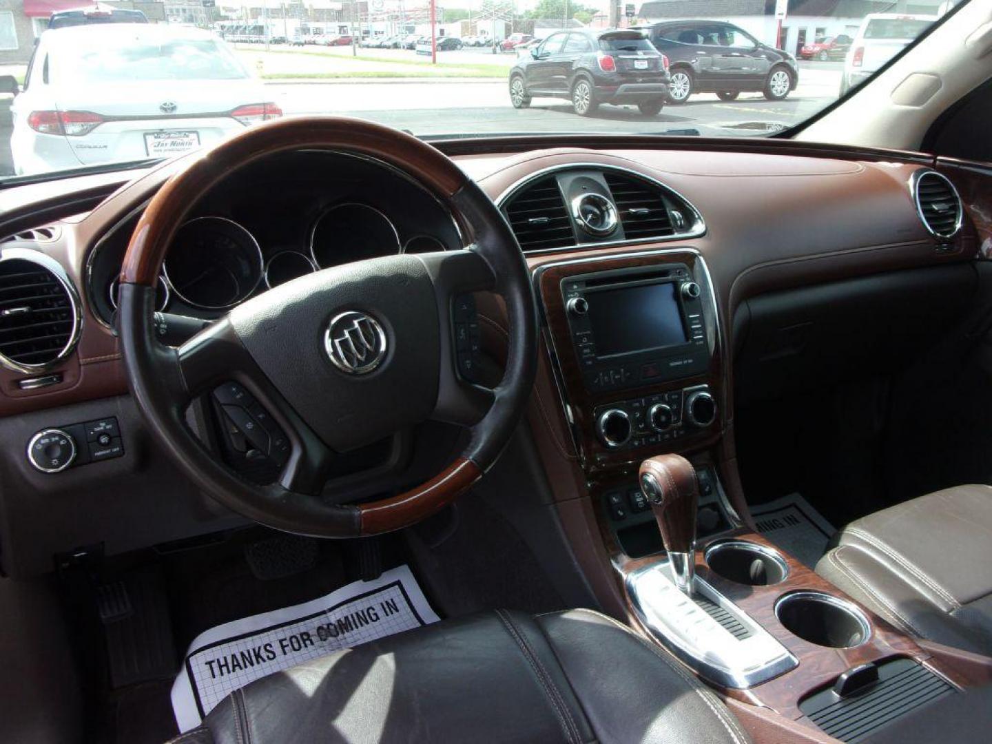 2013 GOLD BUICK ENCLAVE LEATHER GROUP (5GAKRCKD4DJ) with an 3.6L engine, Automatic transmission, located at 501 E. Columbia St., Springfield, OH, 45503, (800) 262-7122, 39.925262, -83.801796 - ***Leather Group***Dual Moonroof***3rd Row Seating***Heated Leather Seating***Rear Captian Chairs***Power Lift Gate***Serviced and Detailed*** - Photo#12