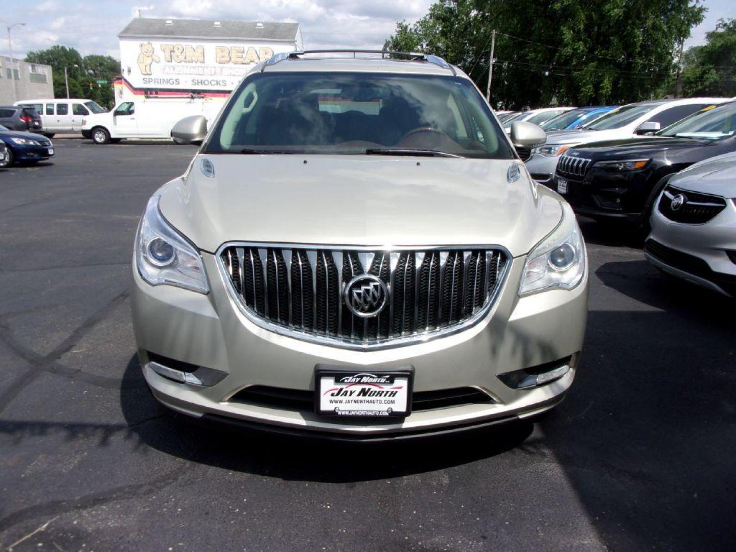 2013 GOLD BUICK ENCLAVE LEATHER GROUP (5GAKRCKD4DJ) with an 3.6L engine, Automatic transmission, located at 501 E. Columbia St., Springfield, OH, 45503, (800) 262-7122, 39.925262, -83.801796 - ***Leather Group***Dual Moonroof***3rd Row Seating***Heated Leather Seating***Rear Captian Chairs***Power Lift Gate***Serviced and Detailed*** - Photo#1