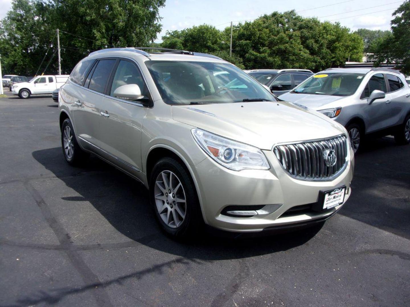 2013 GOLD BUICK ENCLAVE LEATHER GROUP (5GAKRCKD4DJ) with an 3.6L engine, Automatic transmission, located at 501 E. Columbia St., Springfield, OH, 45503, (800) 262-7122, 39.925262, -83.801796 - ***Leather Group***Dual Moonroof***3rd Row Seating***Heated Leather Seating***Rear Captian Chairs***Power Lift Gate***Serviced and Detailed*** - Photo#2