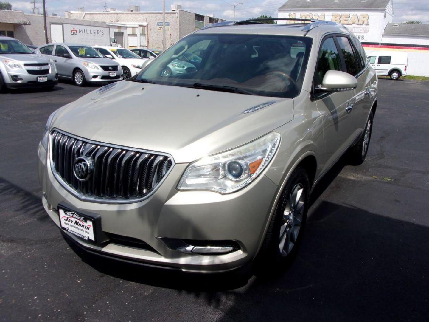 2013 GOLD BUICK ENCLAVE LEATHER GROUP (5GAKRCKD4DJ) with an 3.6L engine, Automatic transmission, located at 501 E. Columbia St., Springfield, OH, 45503, (800) 262-7122, 39.925262, -83.801796 - ***Leather Group***Dual Moonroof***3rd Row Seating***Heated Leather Seating***Rear Captian Chairs***Power Lift Gate***Serviced and Detailed*** - Photo#6