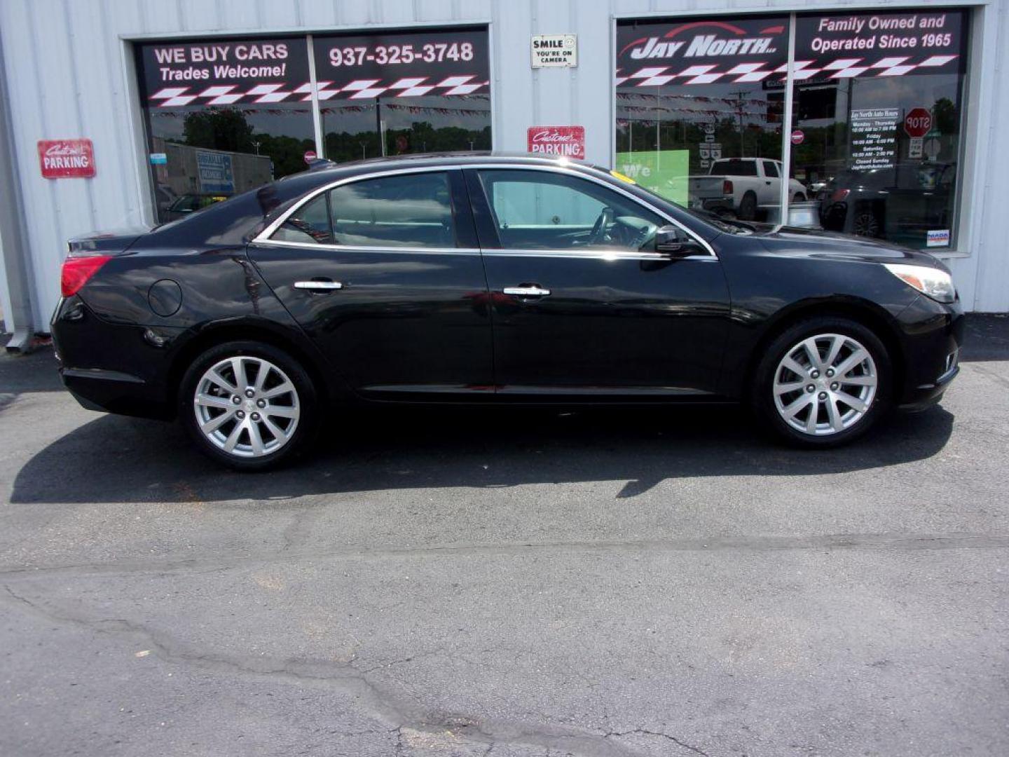 2014 BLACK CHEVROLET MALIBU LTZ (1G11H5SL3EF) with an 2.5L engine, Automatic transmission, located at 501 E. Columbia St., Springfield, OH, 45503, (800) 262-7122, 39.925262, -83.801796 - ***NEW TIRES***LTZ***Heated Leather Seating***Remote Start***Serviced and Detailed*** Jay North Auto has offered hand picked vehicles since 1965! Our customer's enjoy a NO pressure buying experience with a small town feel. All of our vehicles get fully inspected and detailed. We are a preferred - Photo#0