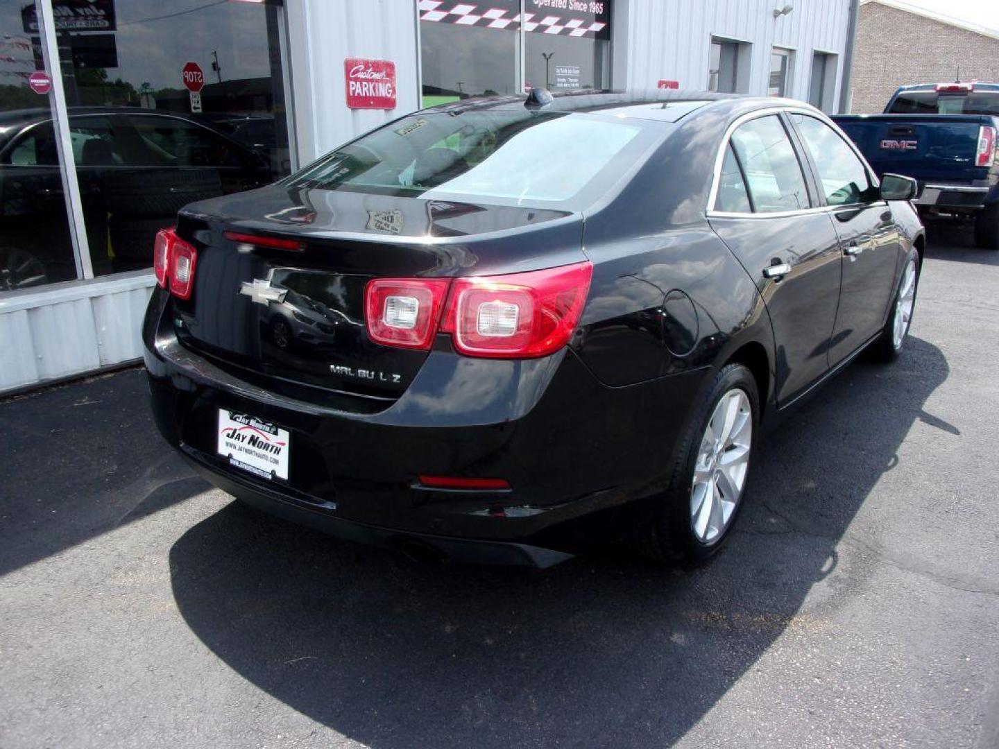 2014 BLACK CHEVROLET MALIBU LTZ (1G11H5SL3EF) with an 2.5L engine, Automatic transmission, located at 501 E. Columbia St., Springfield, OH, 45503, (800) 262-7122, 39.925262, -83.801796 - ***NEW TIRES***LTZ***Heated Leather Seating***Remote Start***Serviced and Detailed*** Jay North Auto has offered hand picked vehicles since 1965! Our customer's enjoy a NO pressure buying experience with a small town feel. All of our vehicles get fully inspected and detailed. We are a preferred - Photo#3