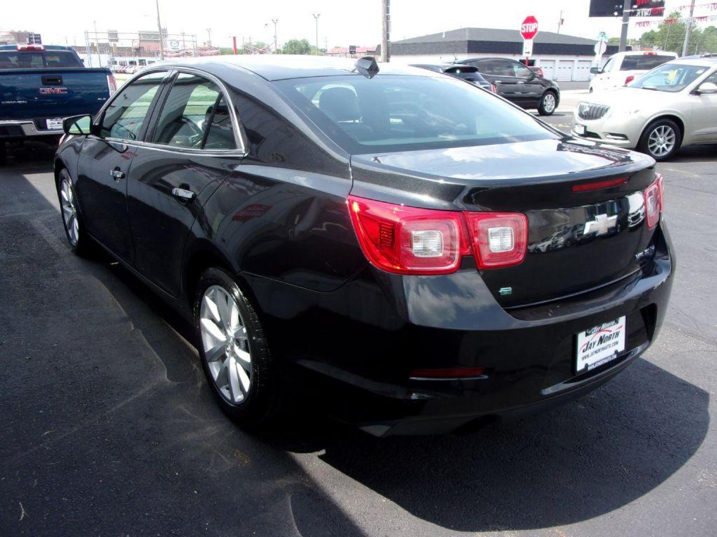 2014 BLACK CHEVROLET MALIBU LTZ (1G11H5SL3EF) with an 2.5L engine, Automatic transmission, located at 501 E. Columbia St., Springfield, OH, 45503, (800) 262-7122, 39.925262, -83.801796 - ***NEW TIRES***LTZ***Heated Leather Seating***Remote Start***Serviced and Detailed*** Jay North Auto has offered hand picked vehicles since 1965! Our customer's enjoy a NO pressure buying experience with a small town feel. All of our vehicles get fully inspected and detailed. We are a preferred - Photo#5