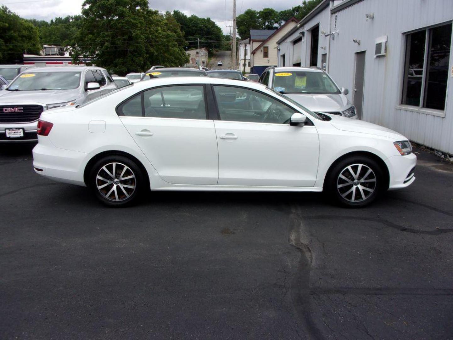 2017 WHITE VOLKSWAGEN JETTA SE (3VWB67AJ0HM) with an 1.4L engine, 5-Speed Manual transmission, located at 501 E. Columbia St., Springfield, OH, 45503, (800) 262-7122, 39.925262, -83.801796 - Photo#0