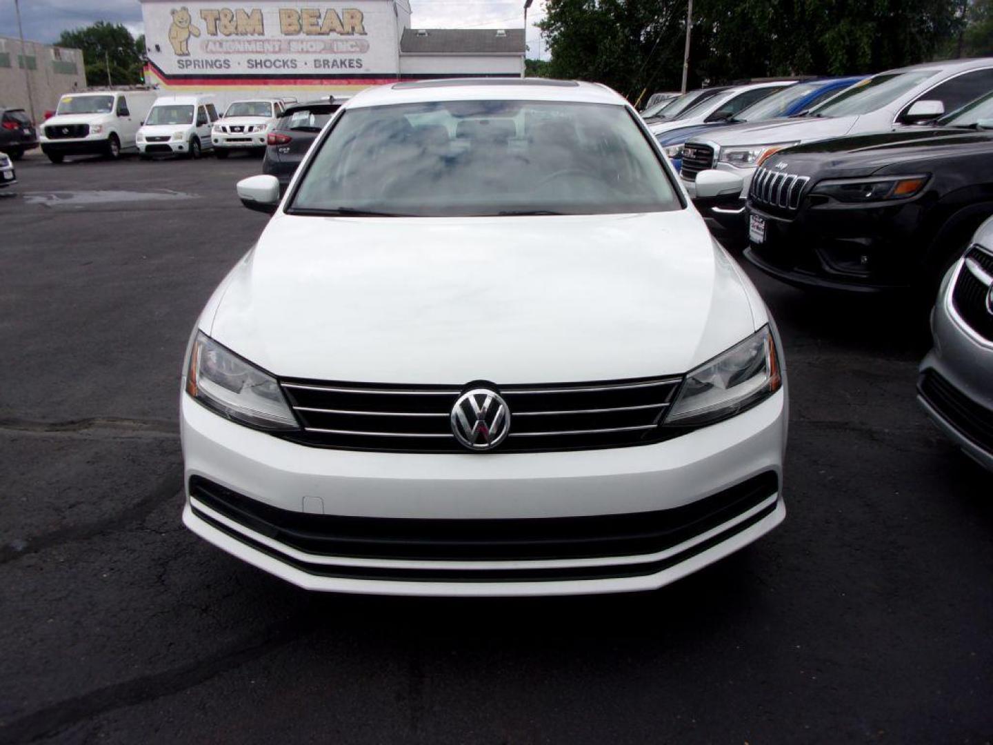 2017 WHITE VOLKSWAGEN JETTA SE (3VWB67AJ0HM) with an 1.4L engine, 5-Speed Manual transmission, located at 501 E. Columbia St., Springfield, OH, 45503, (800) 262-7122, 39.925262, -83.801796 - Photo#1