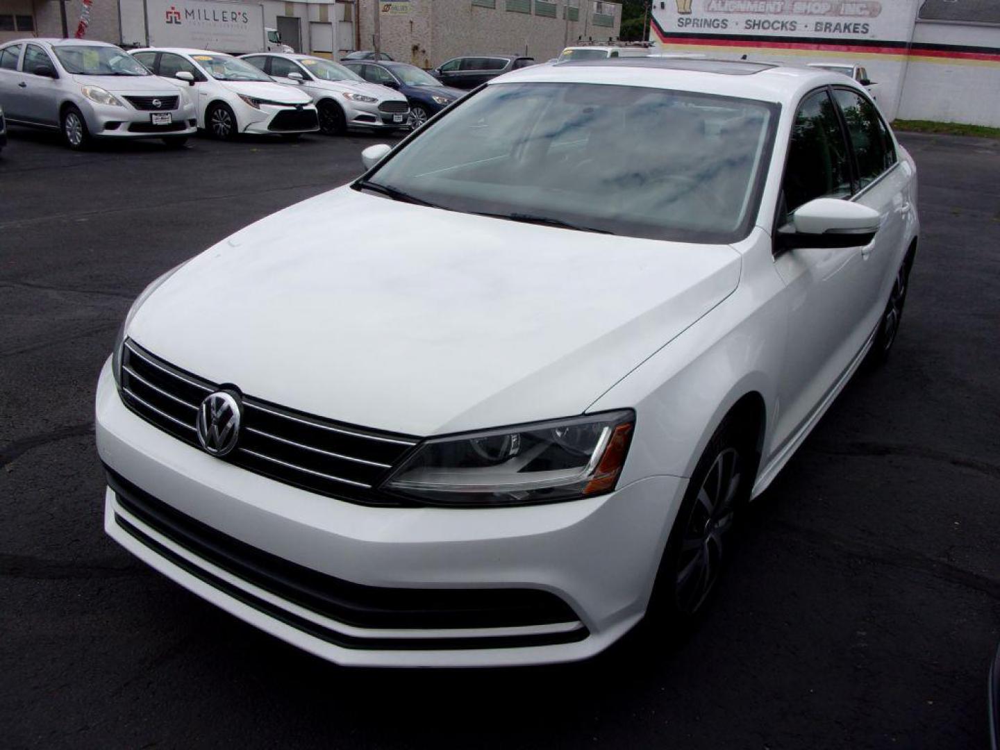 2017 WHITE VOLKSWAGEN JETTA SE (3VWB67AJ0HM) with an 1.4L engine, 5-Speed Manual transmission, located at 501 E. Columbia St., Springfield, OH, 45503, (800) 262-7122, 39.925262, -83.801796 - Photo#6