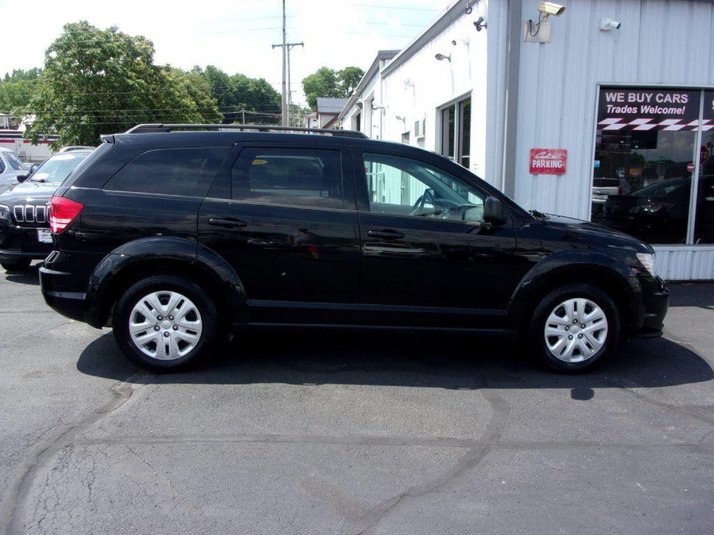 2018 BLACK DODGE JOURNEY SE (3C4PDCAB4JT) with an 2.4L engine, Automatic transmission, located at 501 E. Columbia St., Springfield, OH, 45503, (800) 262-7122, 39.925262, -83.801796 - *** New Tires *** Serviced and Detailed *** 3rd Row Seating *** FWD *** Back Up Camera *** Jay North Auto has offered hand picked vehicles since 1965! Our customer's enjoy a NO pressure buying experience with a small town feel. All of our vehicles get fully inspected and detailed. We are a pref - Photo#0