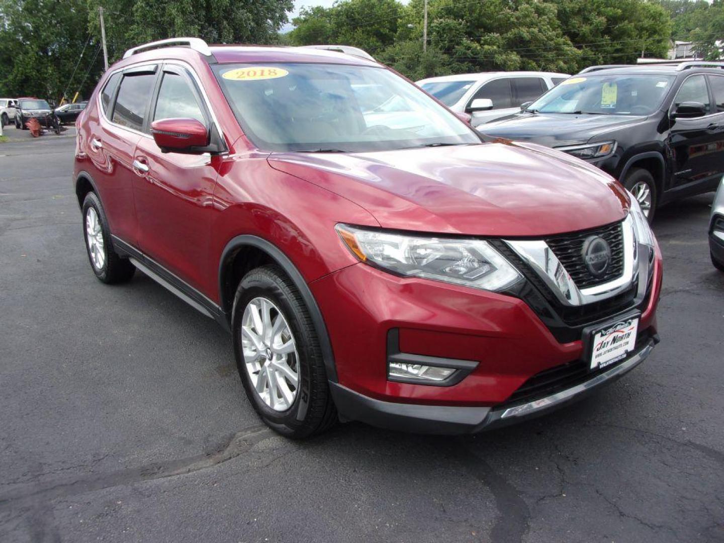 2018 RED NISSAN ROGUE SV (5N1AT2MV4JC) with an 2.5L engine, Continuously Variable transmission, located at 501 E. Columbia St., Springfield, OH, 45503, (800) 262-7122, 39.925262, -83.801796 - Photo#2