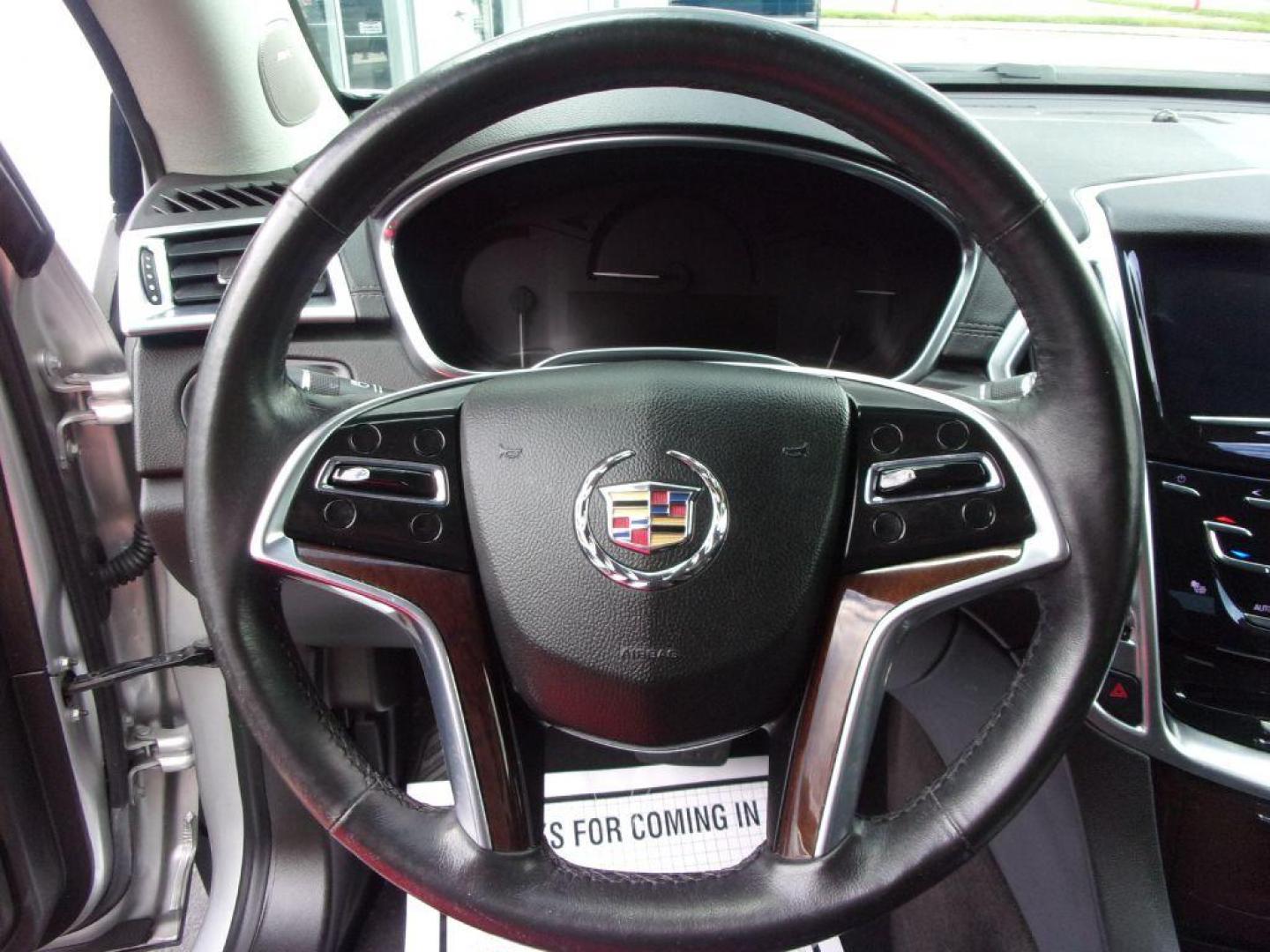 2016 SILVER CADILLAC SRX LUXURY COLLECTION (3GYFNBE33GS) with an 3.6L engine, Automatic transmission, located at 501 E. Columbia St., Springfield, OH, 45503, (800) 262-7122, 39.925262, -83.801796 - Photo#9