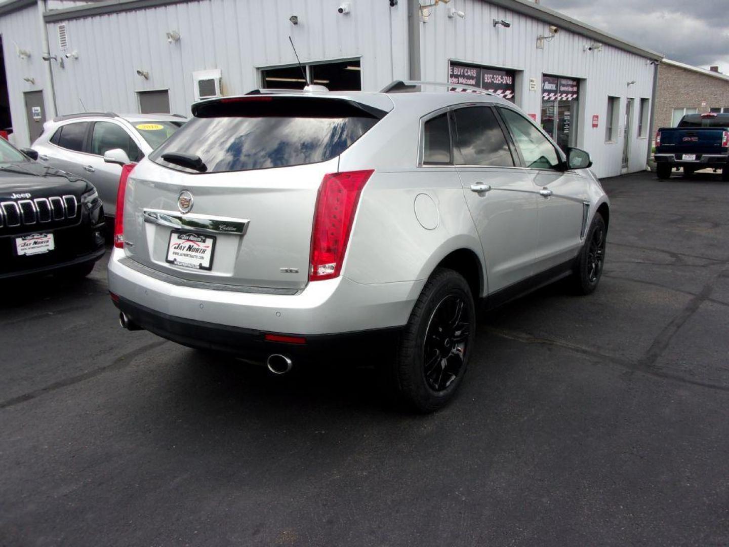 2016 SILVER CADILLAC SRX LUXURY COLLECTION (3GYFNBE33GS) with an 3.6L engine, Automatic transmission, located at 501 E. Columbia St., Springfield, OH, 45503, (800) 262-7122, 39.925262, -83.801796 - Photo#3