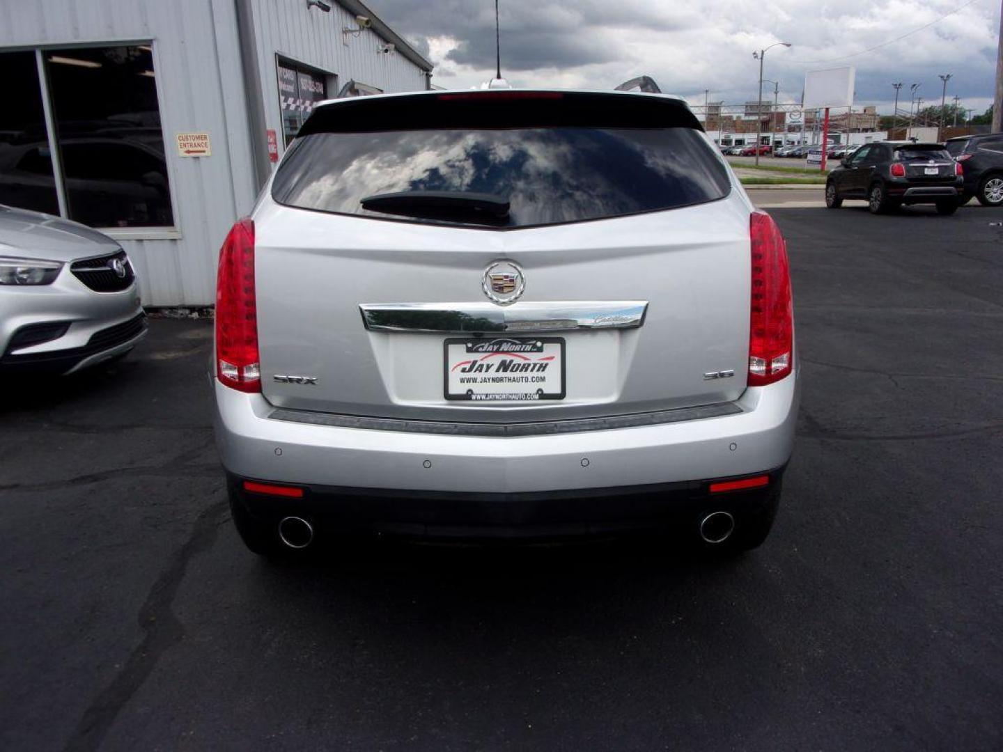 2016 SILVER CADILLAC SRX LUXURY COLLECTION (3GYFNBE33GS) with an 3.6L engine, Automatic transmission, located at 501 E. Columbia St., Springfield, OH, 45503, (800) 262-7122, 39.925262, -83.801796 - Photo#4