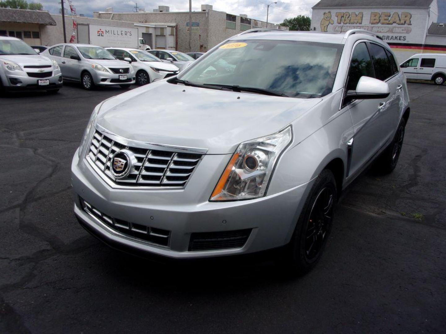 2016 SILVER CADILLAC SRX LUXURY COLLECTION (3GYFNBE33GS) with an 3.6L engine, Automatic transmission, located at 501 E. Columbia St., Springfield, OH, 45503, (800) 262-7122, 39.925262, -83.801796 - Photo#6