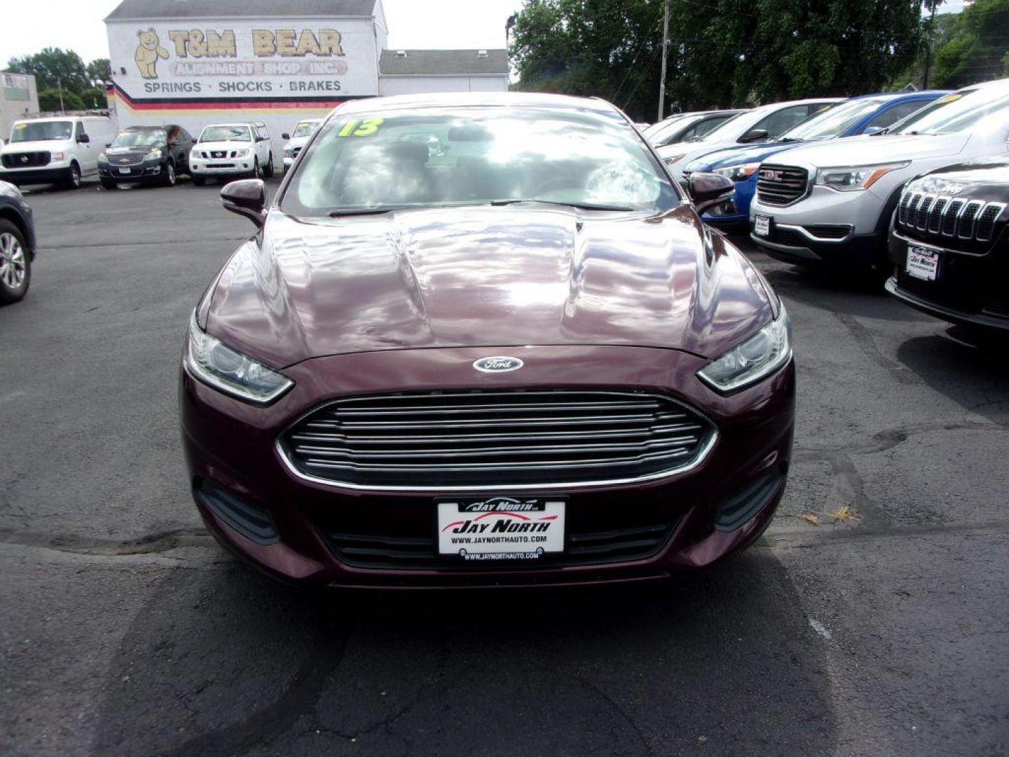 2013 RED FORD FUSION SE (3FA6P0H77DR) with an 2.5L engine, Automatic transmission, located at 501 E. Columbia St., Springfield, OH, 45503, (800) 262-7122, 39.925262, -83.801796 - Photo#1