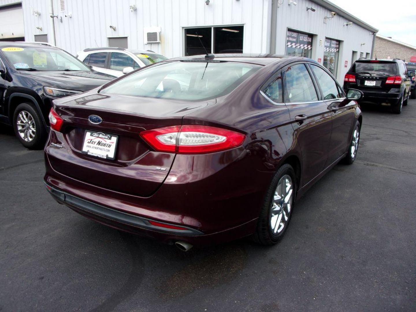 2013 RED FORD FUSION SE (3FA6P0H77DR) with an 2.5L engine, Automatic transmission, located at 501 E. Columbia St., Springfield, OH, 45503, (800) 262-7122, 39.925262, -83.801796 - Photo#3