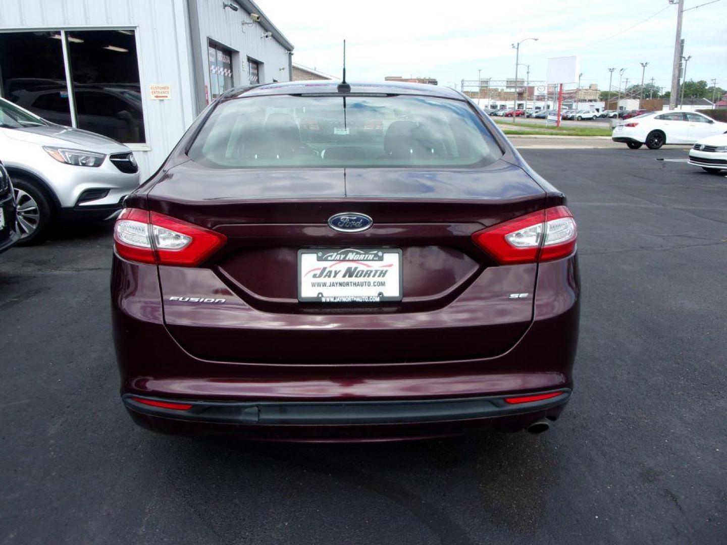 2013 RED FORD FUSION SE (3FA6P0H77DR) with an 2.5L engine, Automatic transmission, located at 501 E. Columbia St., Springfield, OH, 45503, (800) 262-7122, 39.925262, -83.801796 - Photo#4