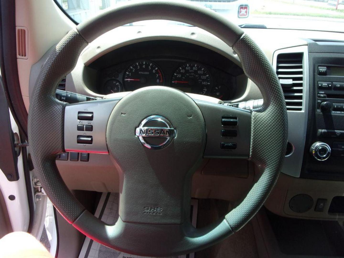 2012 WHITE NISSAN FRONTIER SV (1N6AD0ER4CC) with an 4.0L engine, Automatic transmission, located at 501 E. Columbia St., Springfield, OH, 45503, (800) 262-7122, 39.925262, -83.801796 - ***Clean Carfax***SV***Crew Cab***4.0 V6***Serviced and Detailed*** Jay North Auto has offered hand picked vehicles since 1965! Our customer's enjoy a NO pressure buying experience with a small town feel. All of our vehicles get fully inspected and detailed. We are a preferred dealer for many lo - Photo#9