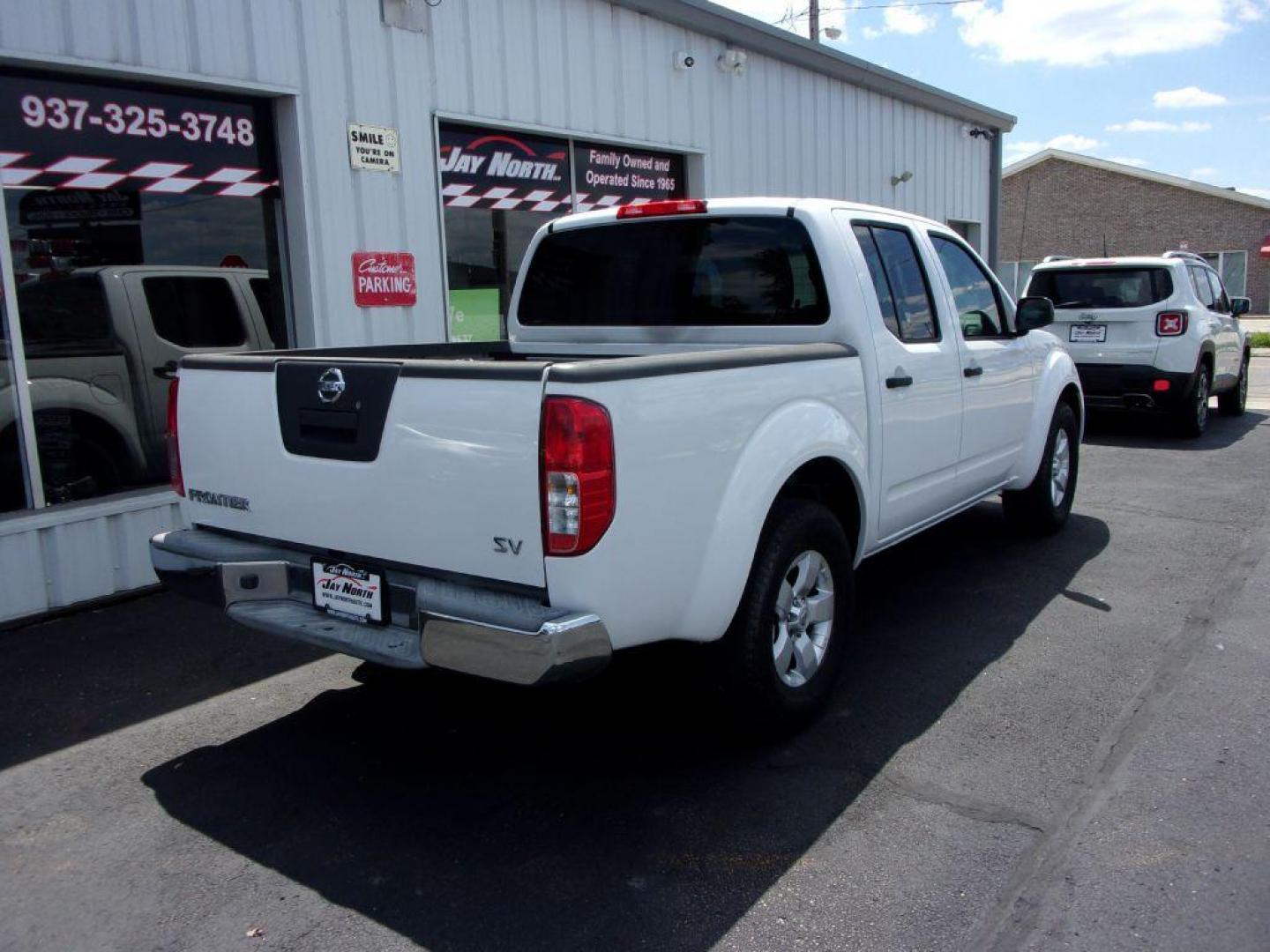 2012 WHITE NISSAN FRONTIER SV (1N6AD0ER4CC) with an 4.0L engine, Automatic transmission, located at 501 E. Columbia St., Springfield, OH, 45503, (800) 262-7122, 39.925262, -83.801796 - ***Clean Carfax***SV***Crew Cab***4.0 V6***Serviced and Detailed*** Jay North Auto has offered hand picked vehicles since 1965! Our customer's enjoy a NO pressure buying experience with a small town feel. All of our vehicles get fully inspected and detailed. We are a preferred dealer for many lo - Photo#3