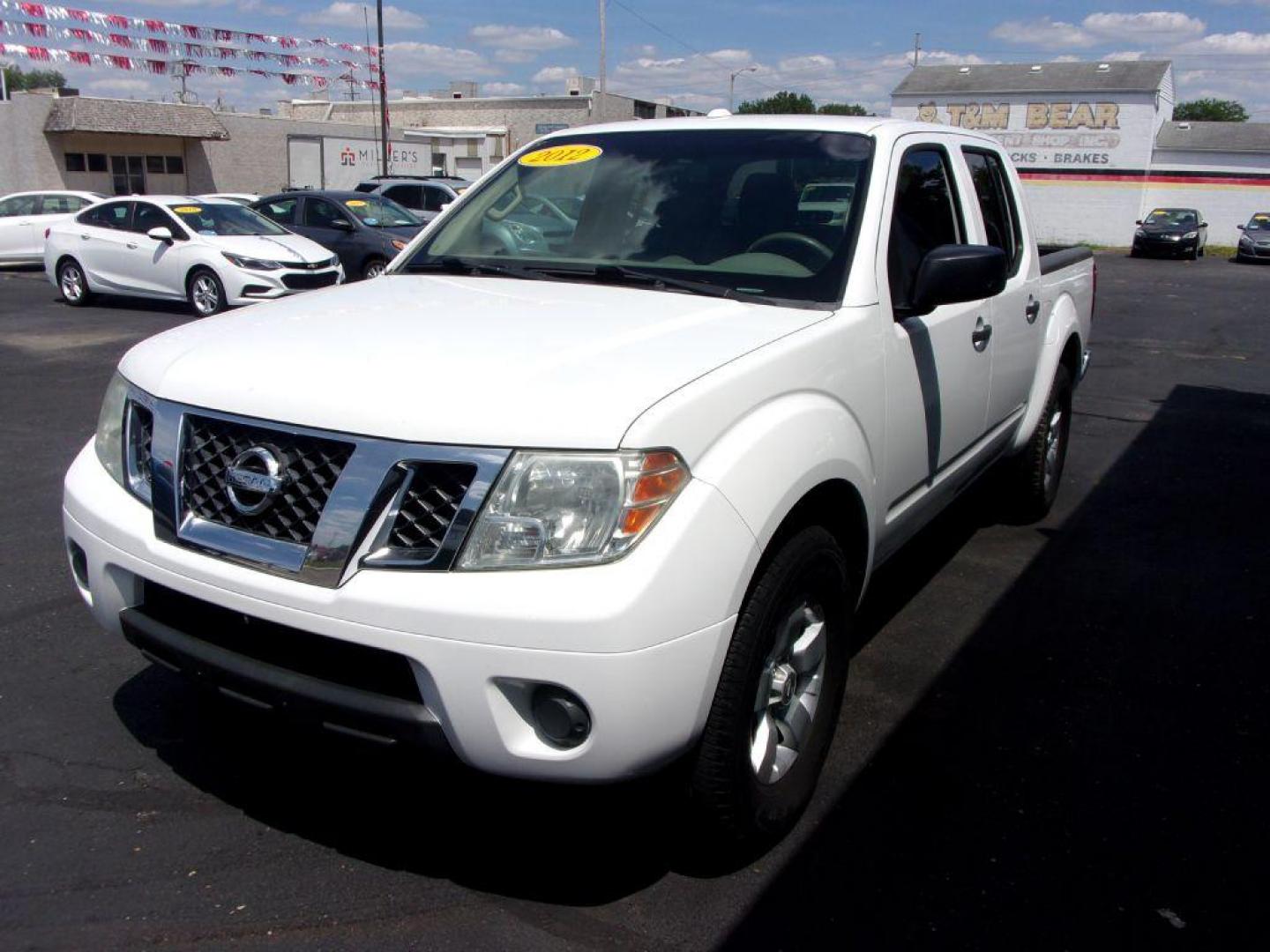 2012 WHITE NISSAN FRONTIER SV (1N6AD0ER4CC) with an 4.0L engine, Automatic transmission, located at 501 E. Columbia St., Springfield, OH, 45503, (800) 262-7122, 39.925262, -83.801796 - ***Clean Carfax***SV***Crew Cab***4.0 V6***Serviced and Detailed*** Jay North Auto has offered hand picked vehicles since 1965! Our customer's enjoy a NO pressure buying experience with a small town feel. All of our vehicles get fully inspected and detailed. We are a preferred dealer for many lo - Photo#6