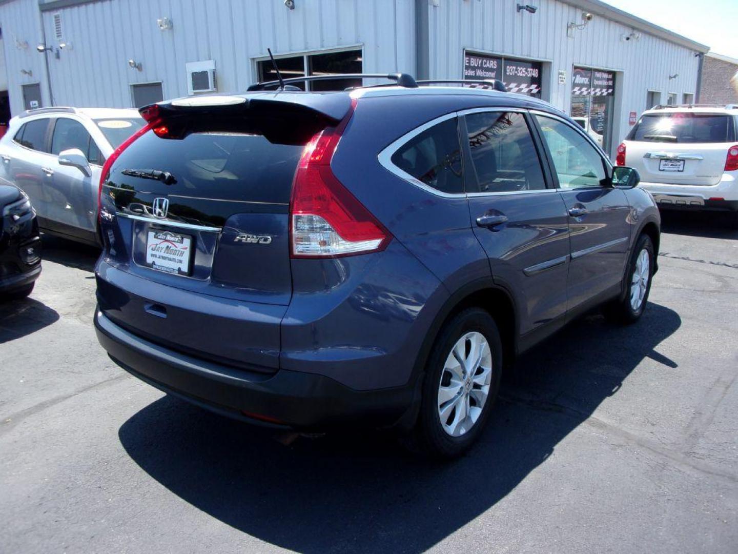 2013 BLUE HONDA CR-V EXL (5J6RM4H72DL) with an 2.4L engine, Automatic transmission, located at 501 E. Columbia St., Springfield, OH, 45503, (800) 262-7122, 39.925262, -83.801796 - ***1-Owner***AWD***EXL***Updated Timing***Leather***Moonroof***Serviced and Detailed*** Jay North Auto has offered hand picked vehicles since 1965! Our customer's enjoy a NO pressure buying experience with a small town feel. All of our vehicles get fully inspected and detailed. We are a preferre - Photo#3