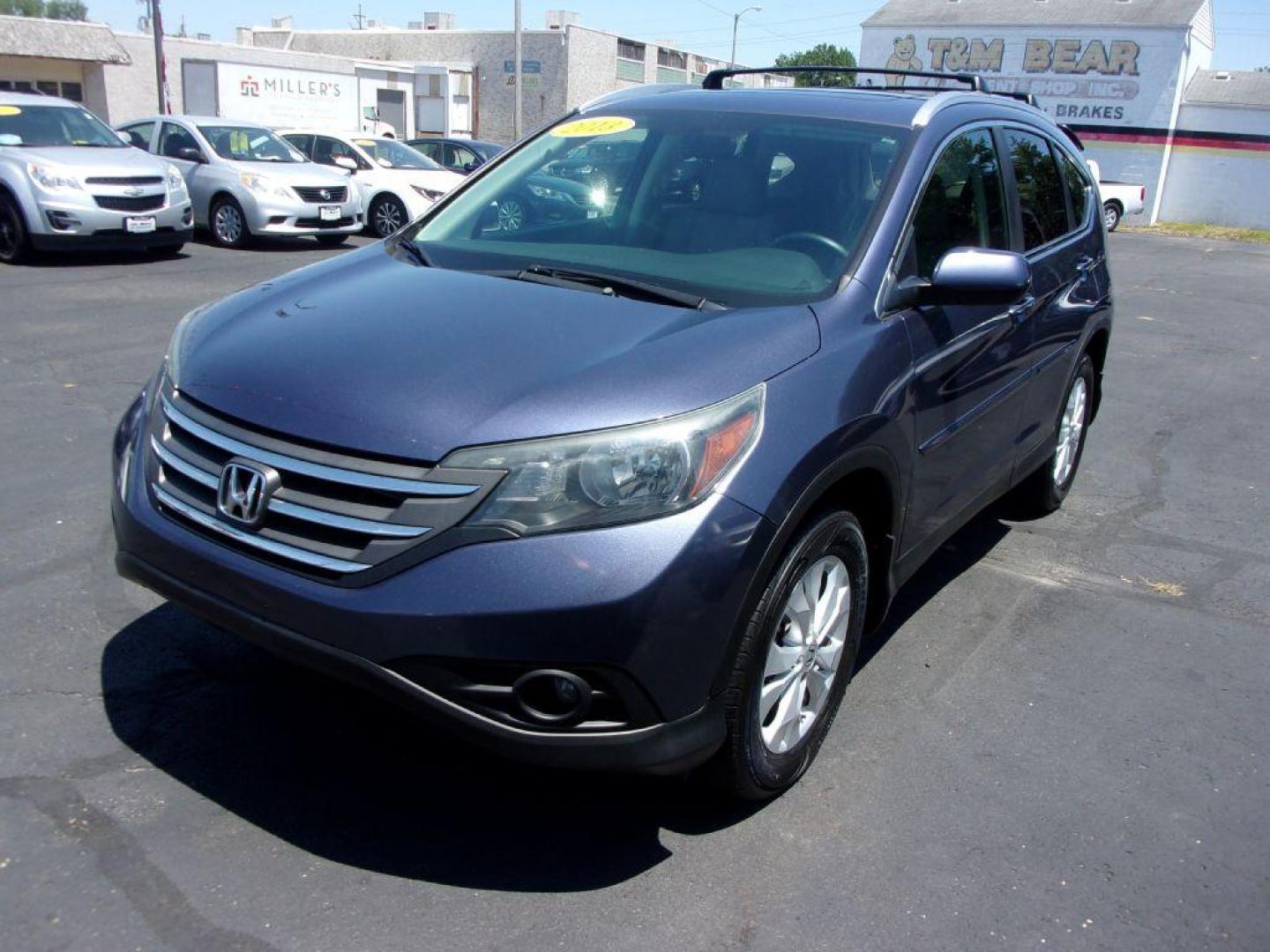 2013 BLUE HONDA CR-V EXL (5J6RM4H72DL) with an 2.4L engine, Automatic transmission, located at 501 E. Columbia St., Springfield, OH, 45503, (800) 262-7122, 39.925262, -83.801796 - ***1-Owner***AWD***EXL***Updated Timing***Leather***Moonroof***Serviced and Detailed*** Jay North Auto has offered hand picked vehicles since 1965! Our customer's enjoy a NO pressure buying experience with a small town feel. All of our vehicles get fully inspected and detailed. We are a preferre - Photo#6