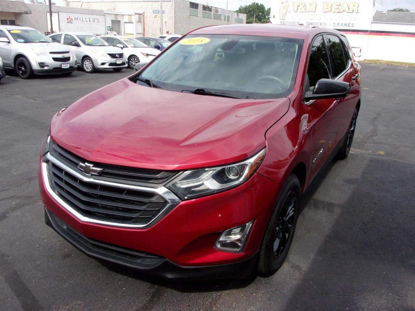 2018 RED CHEVROLET EQUINOX LT (3GNAXJEV9JL) with an 1.5L engine, Automatic transmission, located at 501 E. Columbia St., Springfield, OH, 45503, (800) 262-7122, 39.925262, -83.801796 - ***Clean Carfax***LT***Back-up Camera***Serviced and Detailed*** Jay North Auto has offered hand picked vehicles since 1965! Our customer's enjoy a NO pressure buying experience with a small town feel. All of our vehicles get fully inspected and detailed. We are a preferred dealer for many local - Photo#2