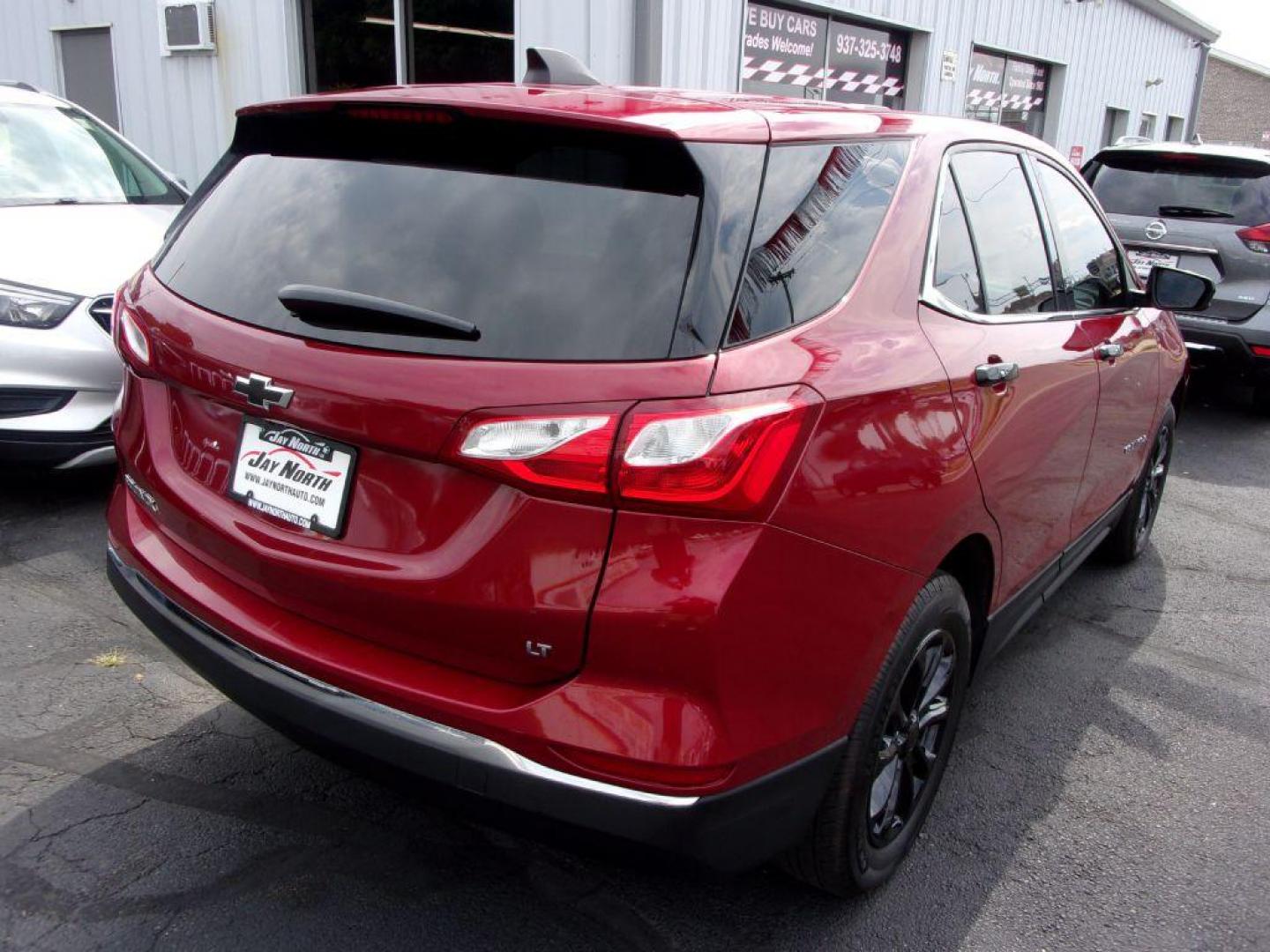 2018 RED CHEVROLET EQUINOX LT (3GNAXJEV9JL) with an 1.5L engine, Automatic transmission, located at 501 E. Columbia St., Springfield, OH, 45503, (800) 262-7122, 39.925262, -83.801796 - ***Clean Carfax***LT***Back-up Camera***Serviced and Detailed*** Jay North Auto has offered hand picked vehicles since 1965! Our customer's enjoy a NO pressure buying experience with a small town feel. All of our vehicles get fully inspected and detailed. We are a preferred dealer for many local - Photo#5