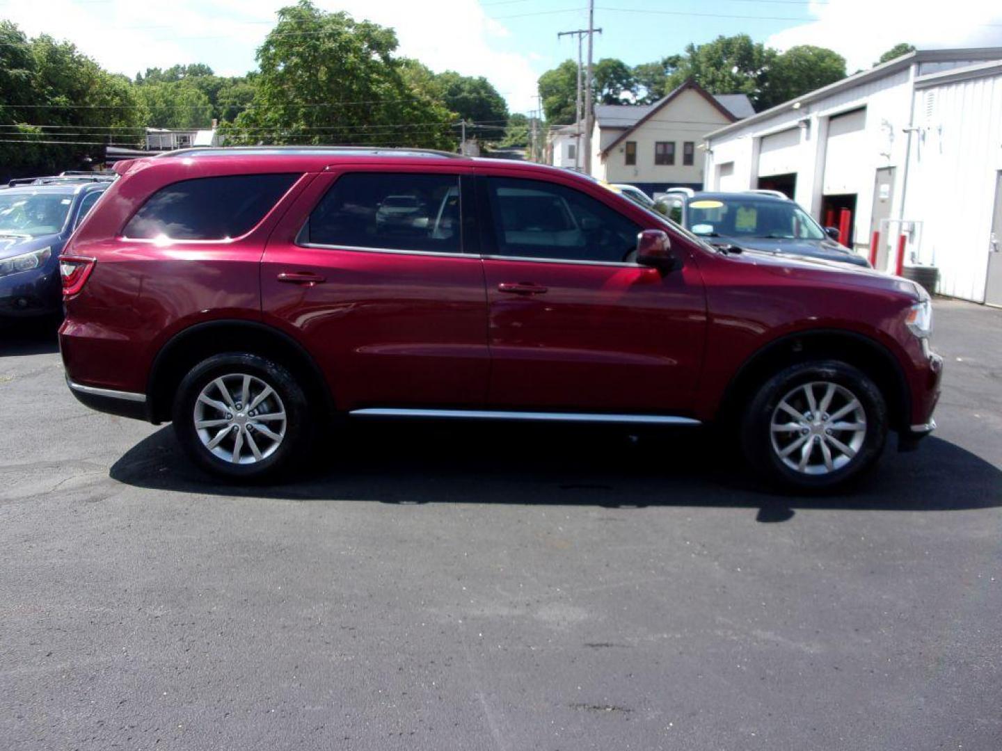 2017 RED DODGE DURANGO SXT (1C4RDJAG0HC) with an 3.6L engine, Automatic transmission, located at 501 E. Columbia St., Springfield, OH, 45503, (800) 262-7122, 39.925262, -83.801796 - *** Serviced and Detailed *** AWD V6 *** 3rd Row Seating *** SXT *** Customer Preferred Package 23B $2,200 Bright Side Roof Rails Comfort Seating Group Integrated Roof Rail Crossbars Leather-Wrapped Steering Wheel Power 4-Way Driver Lumbar Adjust Power 8-Way Driver Seat / Manual Passenger - Photo#0