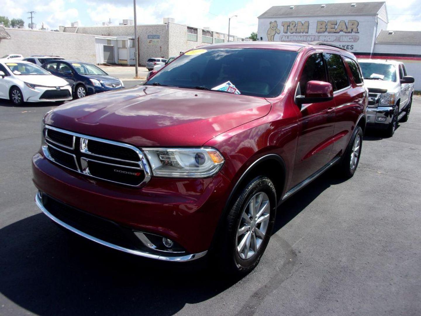 2017 RED DODGE DURANGO SXT (1C4RDJAG0HC) with an 3.6L engine, Automatic transmission, located at 501 E. Columbia St., Springfield, OH, 45503, (800) 262-7122, 39.925262, -83.801796 - *** Serviced and Detailed *** AWD V6 *** 3rd Row Seating *** SXT *** Customer Preferred Package 23B $2,200 Bright Side Roof Rails Comfort Seating Group Integrated Roof Rail Crossbars Leather-Wrapped Steering Wheel Power 4-Way Driver Lumbar Adjust Power 8-Way Driver Seat / Manual Passenger - Photo#1