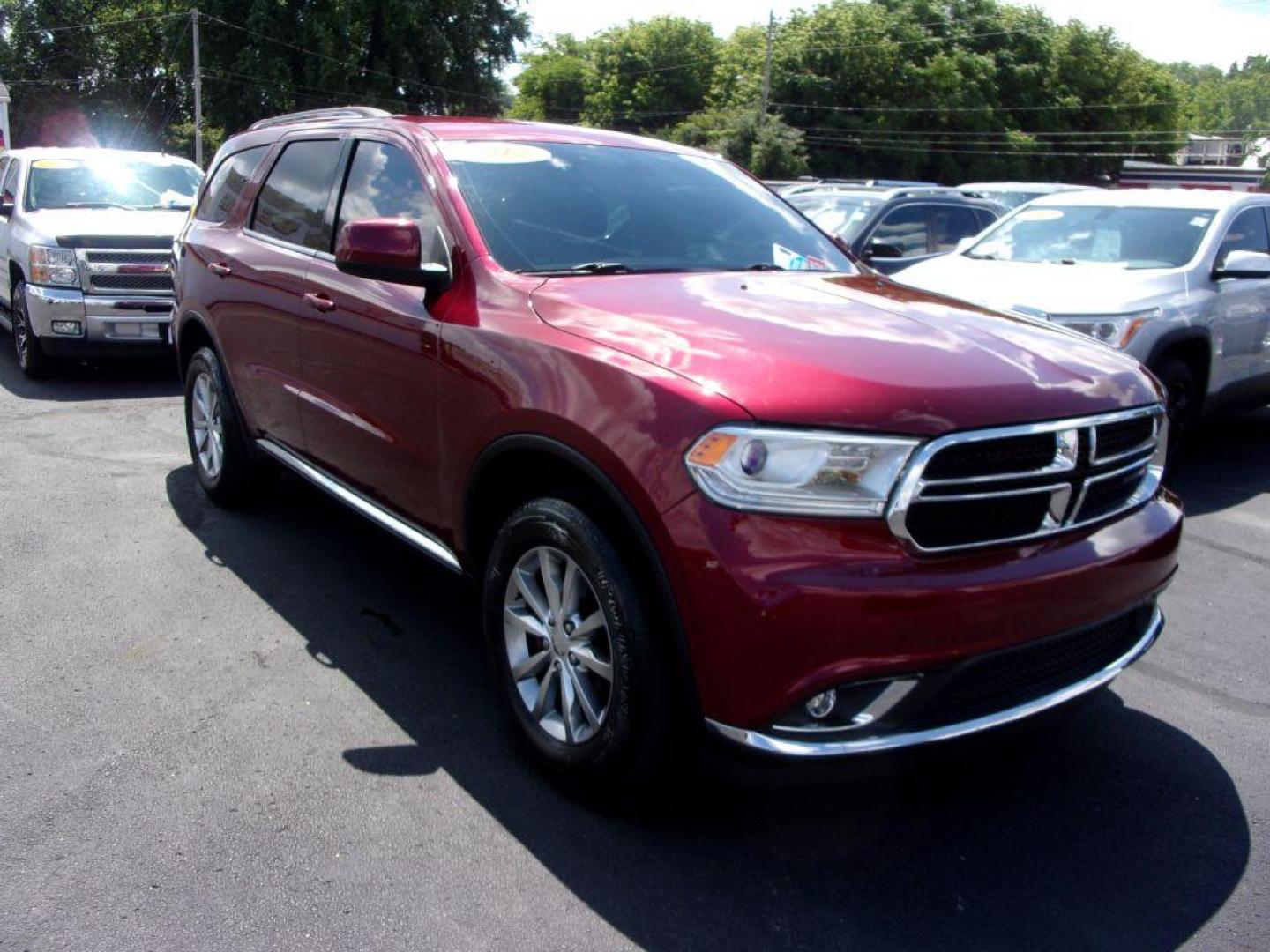 2017 RED DODGE DURANGO SXT (1C4RDJAG0HC) with an 3.6L engine, Automatic transmission, located at 501 E. Columbia St., Springfield, OH, 45503, (800) 262-7122, 39.925262, -83.801796 - *** Serviced and Detailed *** AWD V6 *** 3rd Row Seating *** SXT *** Customer Preferred Package 23B $2,200 Bright Side Roof Rails Comfort Seating Group Integrated Roof Rail Crossbars Leather-Wrapped Steering Wheel Power 4-Way Driver Lumbar Adjust Power 8-Way Driver Seat / Manual Passenger - Photo#3