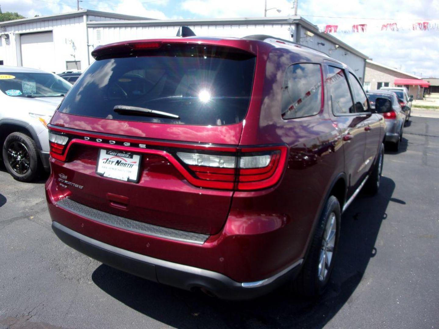 2017 RED DODGE DURANGO SXT (1C4RDJAG0HC) with an 3.6L engine, Automatic transmission, located at 501 E. Columbia St., Springfield, OH, 45503, (800) 262-7122, 39.925262, -83.801796 - *** Serviced and Detailed *** AWD V6 *** 3rd Row Seating *** SXT *** Customer Preferred Package 23B $2,200 Bright Side Roof Rails Comfort Seating Group Integrated Roof Rail Crossbars Leather-Wrapped Steering Wheel Power 4-Way Driver Lumbar Adjust Power 8-Way Driver Seat / Manual Passenger - Photo#4