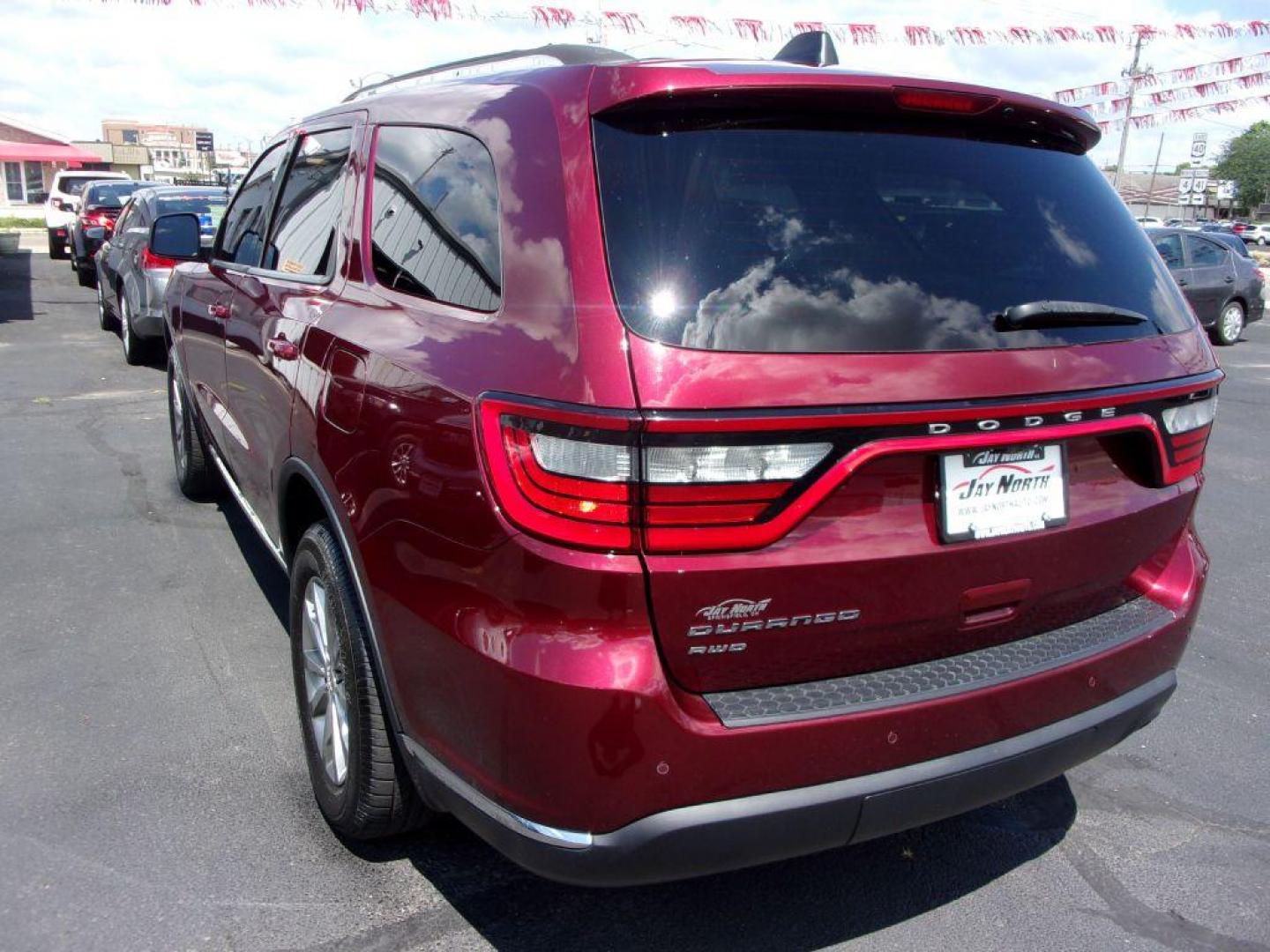 2017 RED DODGE DURANGO SXT (1C4RDJAG0HC) with an 3.6L engine, Automatic transmission, located at 501 E. Columbia St., Springfield, OH, 45503, (800) 262-7122, 39.925262, -83.801796 - *** Serviced and Detailed *** AWD V6 *** 3rd Row Seating *** SXT *** Customer Preferred Package 23B $2,200 Bright Side Roof Rails Comfort Seating Group Integrated Roof Rail Crossbars Leather-Wrapped Steering Wheel Power 4-Way Driver Lumbar Adjust Power 8-Way Driver Seat / Manual Passenger - Photo#5