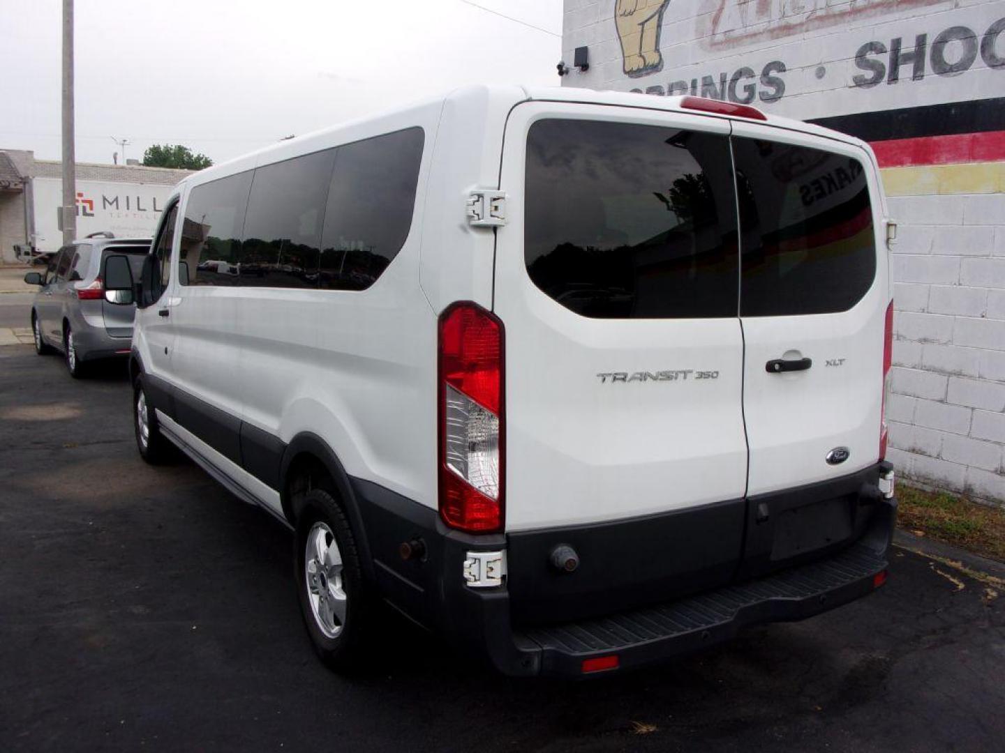 2018 WHITE FORD TRANSIT T-350 XLT WAGON (1FBZX2YM1JK) with an 3.7L engine, Automatic transmission, located at 501 E. Columbia St., Springfield, OH, 45503, (800) 262-7122, 39.925262, -83.801796 - *** XLT *** 12 Passenger *** Serviced and Detailed *** Jay North Auto has offered hand picked vehicles since 1965! Our customer's enjoy a NO pressure buying experience with a small town feel. All of our vehicles get fully inspected and detailed. We are a preferred dealer for many local credit - Photo#9