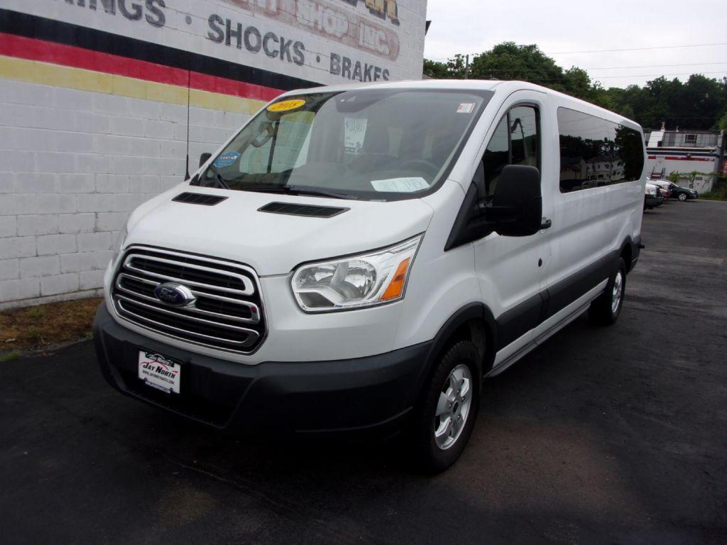 2018 WHITE FORD TRANSIT T-350 XLT WAGON (1FBZX2YM1JK) with an 3.7L engine, Automatic transmission, located at 501 E. Columbia St., Springfield, OH, 45503, (800) 262-7122, 39.925262, -83.801796 - *** XLT *** 12 Passenger *** Serviced and Detailed *** Jay North Auto has offered hand picked vehicles since 1965! Our customer's enjoy a NO pressure buying experience with a small town feel. All of our vehicles get fully inspected and detailed. We are a preferred dealer for many local credit - Photo#1