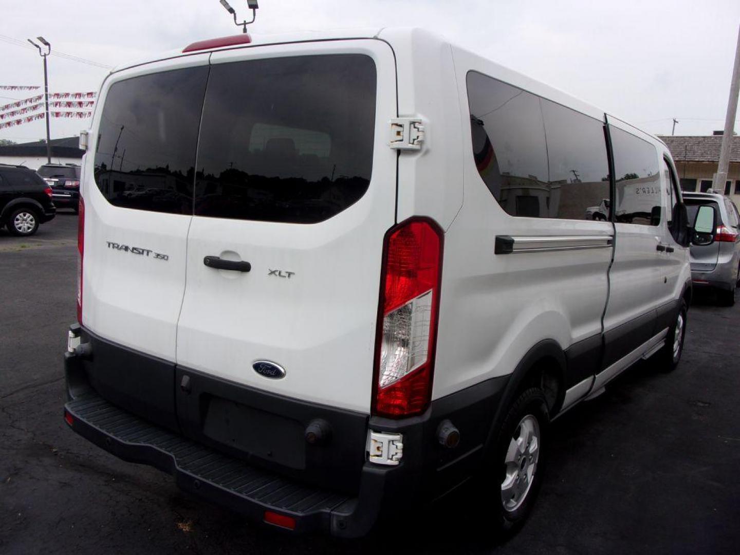 2018 WHITE FORD TRANSIT T-350 XLT WAGON (1FBZX2YM1JK) with an 3.7L engine, Automatic transmission, located at 501 E. Columbia St., Springfield, OH, 45503, (800) 262-7122, 39.925262, -83.801796 - *** XLT *** 12 Passenger *** Serviced and Detailed *** Jay North Auto has offered hand picked vehicles since 1965! Our customer's enjoy a NO pressure buying experience with a small town feel. All of our vehicles get fully inspected and detailed. We are a preferred dealer for many local credit - Photo#7