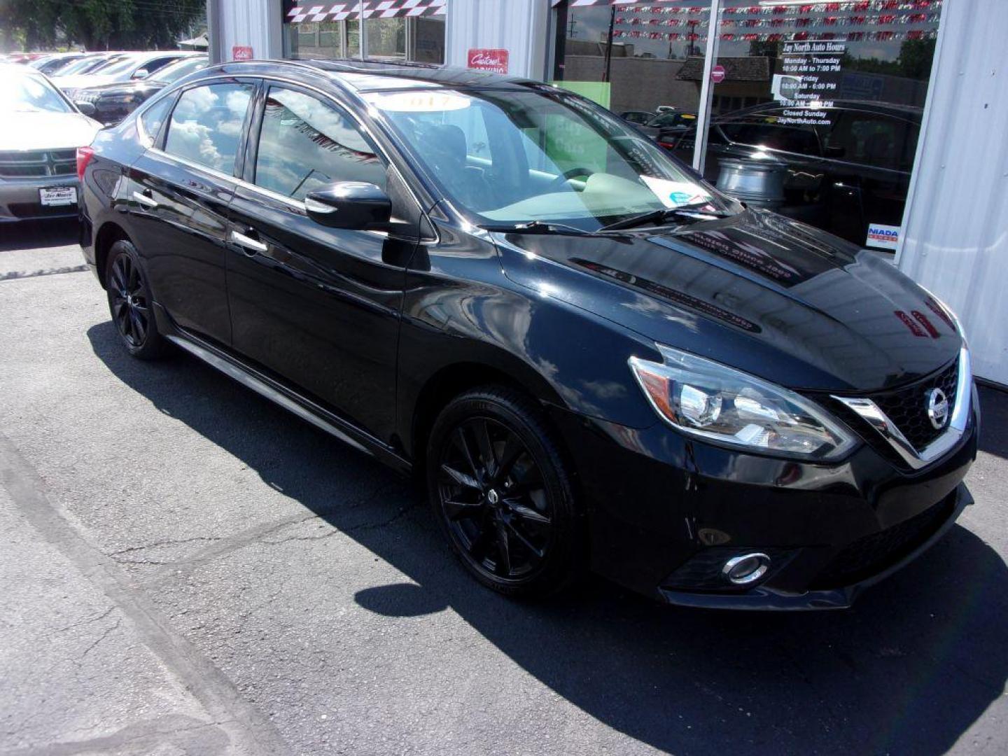 2017 BLACK NISSAN SENTRA SR TURBO (3N1CB7AP3HY) with an 1.6L engine, 6-Speed Manual transmission, located at 501 E. Columbia St., Springfield, OH, 45503, (800) 262-7122, 39.925262, -83.801796 - *** SR Turbo *** 6 Speed Manual *** Midnight Package *** Serviced and Detailed *** Jay North Auto has offered hand picked vehicles since 1965! Our customer's enjoy a NO pressure buying experience with a small town feel. All of our vehicles get fully inspected and detailed. We are a preferred de - Photo#1