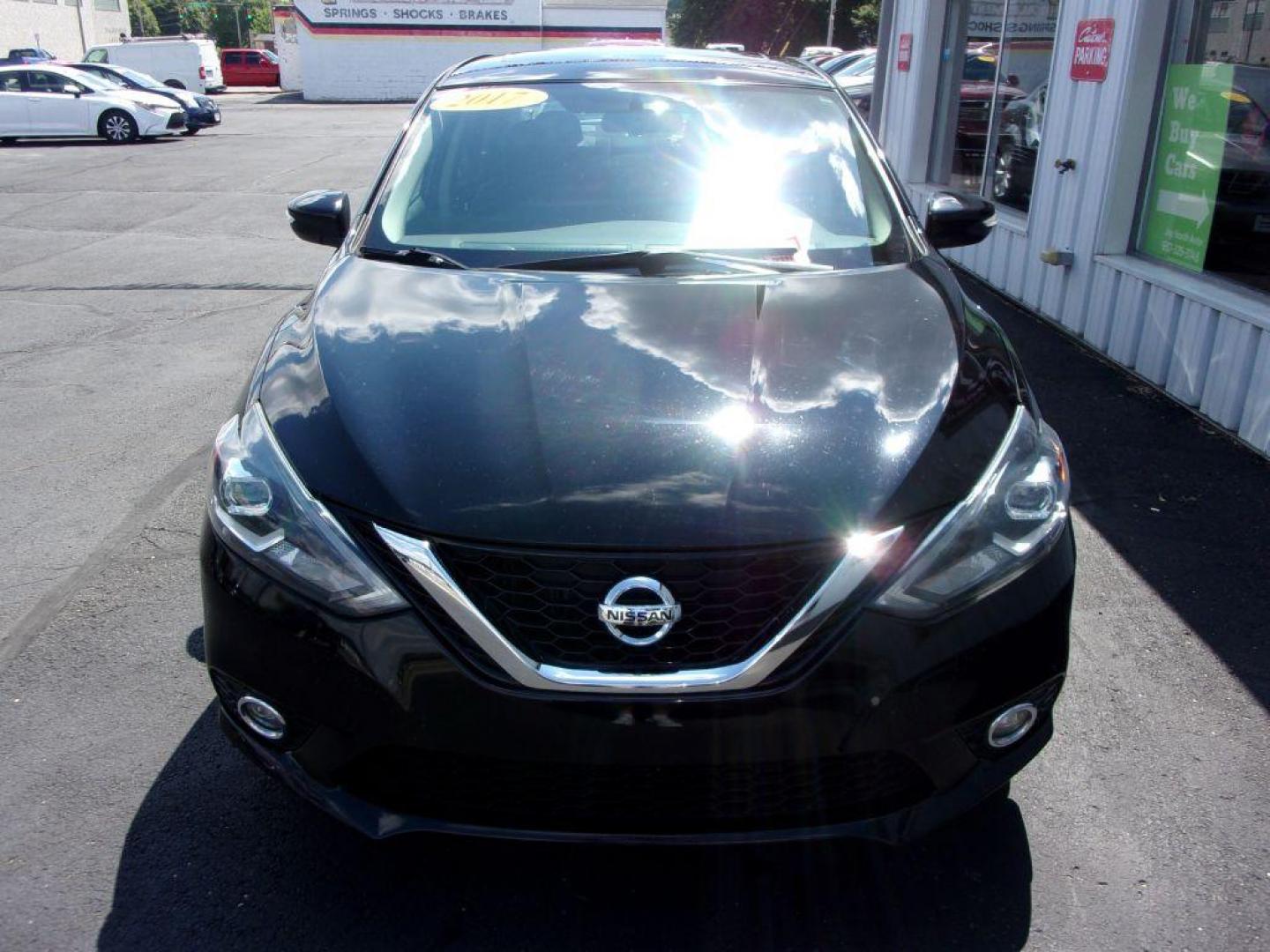 2017 BLACK NISSAN SENTRA SR TURBO (3N1CB7AP3HY) with an 1.6L engine, 6-Speed Manual transmission, located at 501 E. Columbia St., Springfield, OH, 45503, (800) 262-7122, 39.925262, -83.801796 - Photo#2