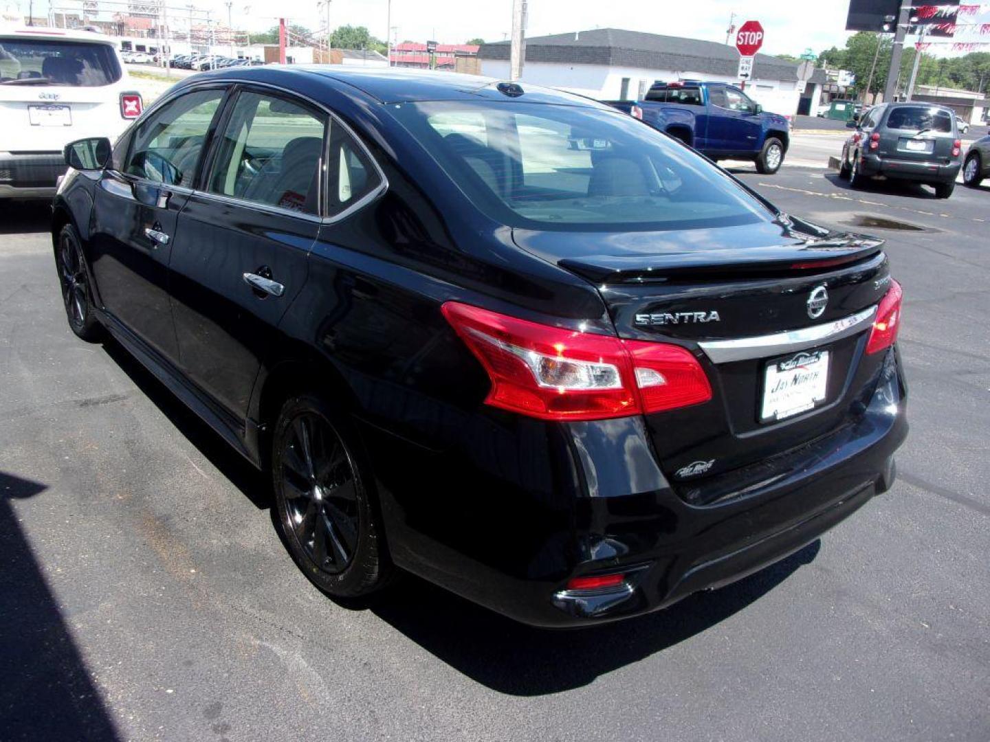 2017 BLACK NISSAN SENTRA SR TURBO (3N1CB7AP3HY) with an 1.6L engine, 6-Speed Manual transmission, located at 501 E. Columbia St., Springfield, OH, 45503, (800) 262-7122, 39.925262, -83.801796 - *** SR Turbo *** 6 Speed Manual *** Midnight Package *** Serviced and Detailed *** Jay North Auto has offered hand picked vehicles since 1965! Our customer's enjoy a NO pressure buying experience with a small town feel. All of our vehicles get fully inspected and detailed. We are a preferred de - Photo#4