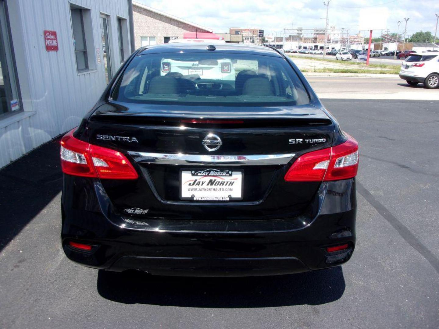 2017 BLACK NISSAN SENTRA SR TURBO (3N1CB7AP3HY) with an 1.6L engine, 6-Speed Manual transmission, located at 501 E. Columbia St., Springfield, OH, 45503, (800) 262-7122, 39.925262, -83.801796 - *** SR Turbo *** 6 Speed Manual *** Midnight Package *** Serviced and Detailed *** Jay North Auto has offered hand picked vehicles since 1965! Our customer's enjoy a NO pressure buying experience with a small town feel. All of our vehicles get fully inspected and detailed. We are a preferred de - Photo#5