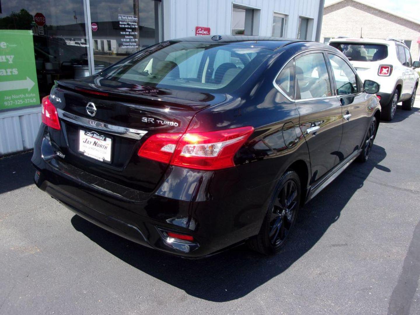 2017 BLACK NISSAN SENTRA SR TURBO (3N1CB7AP3HY) with an 1.6L engine, 6-Speed Manual transmission, located at 501 E. Columbia St., Springfield, OH, 45503, (800) 262-7122, 39.925262, -83.801796 - *** SR Turbo *** 6 Speed Manual *** Midnight Package *** Serviced and Detailed *** Jay North Auto has offered hand picked vehicles since 1965! Our customer's enjoy a NO pressure buying experience with a small town feel. All of our vehicles get fully inspected and detailed. We are a preferred de - Photo#6