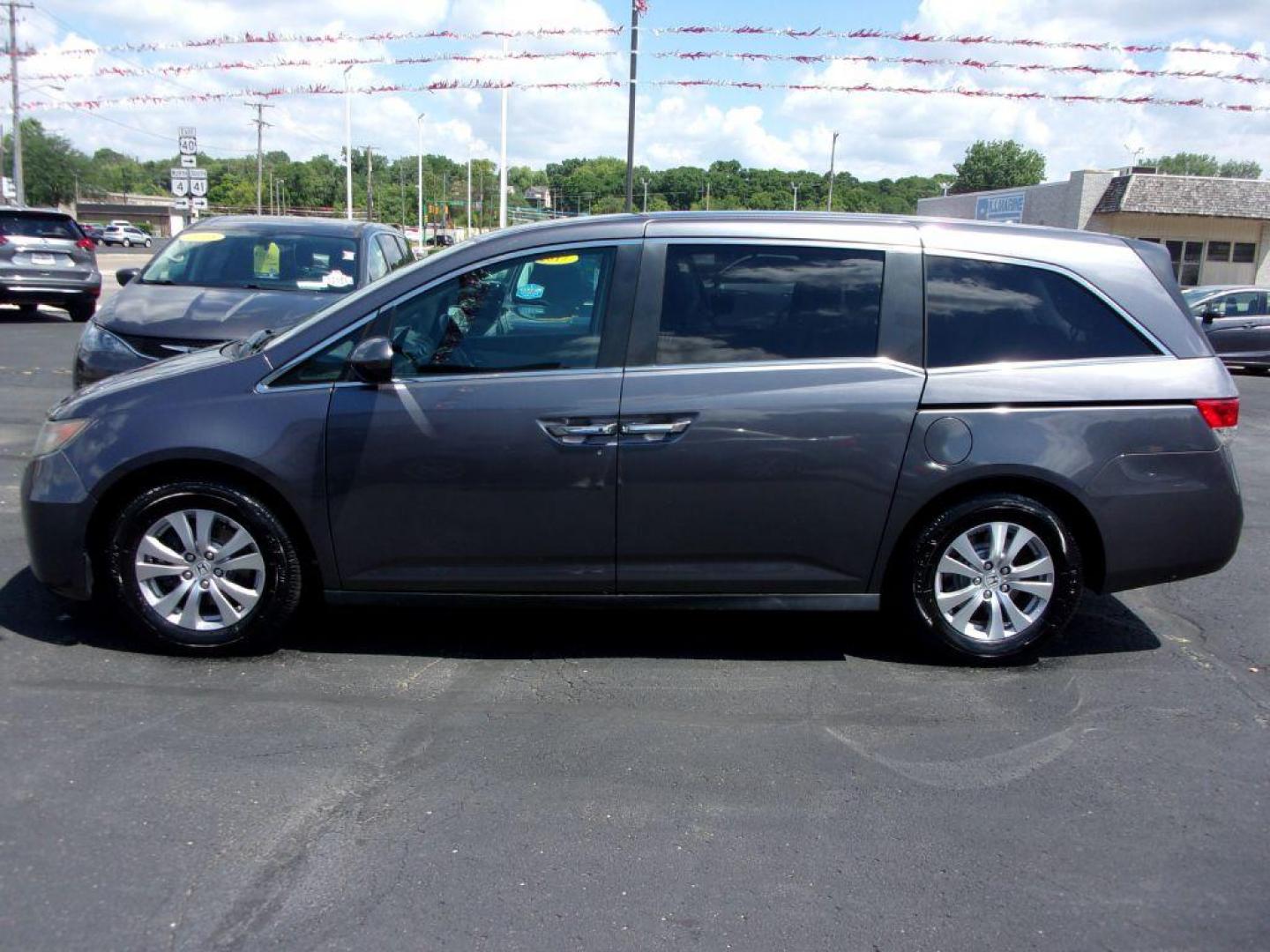 2016 GRAY HONDA ODYSSEY SE (5FNRL5H3XGB) with an 3.5L engine, Automatic transmission, located at 501 E. Columbia St., Springfield, OH, 45503, (800) 262-7122, 39.925262, -83.801796 - Photo#0