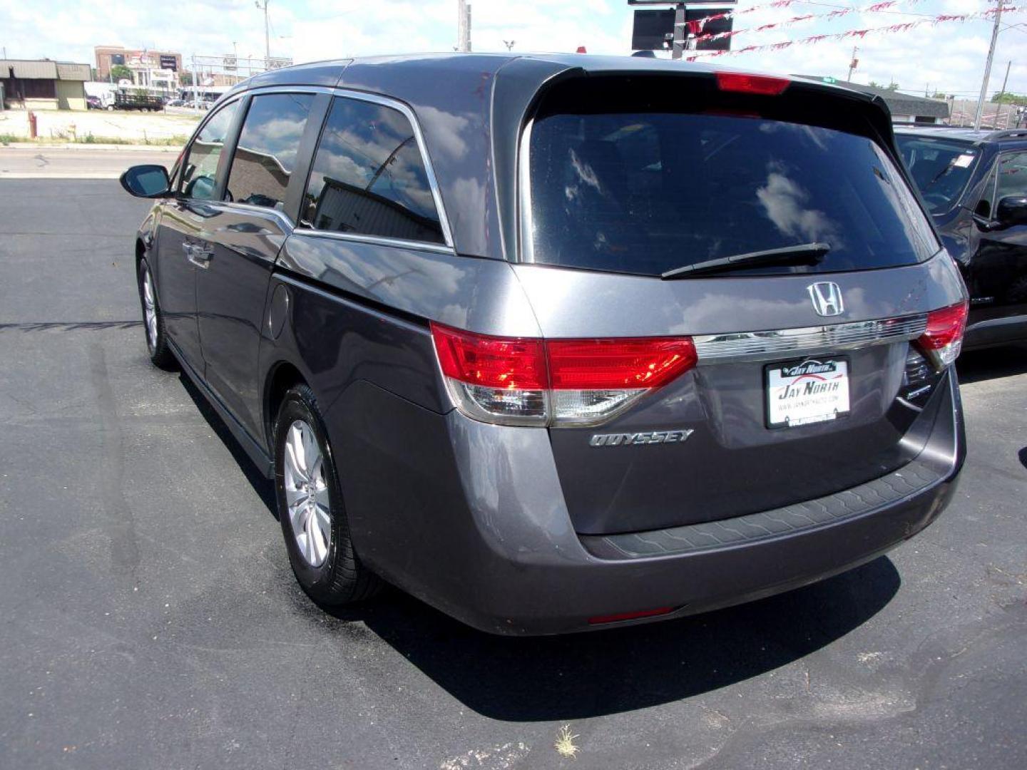 2016 GRAY HONDA ODYSSEY SE (5FNRL5H3XGB) with an 3.5L engine, Automatic transmission, located at 501 E. Columbia St., Springfield, OH, 45503, (800) 262-7122, 39.925262, -83.801796 - Photo#4