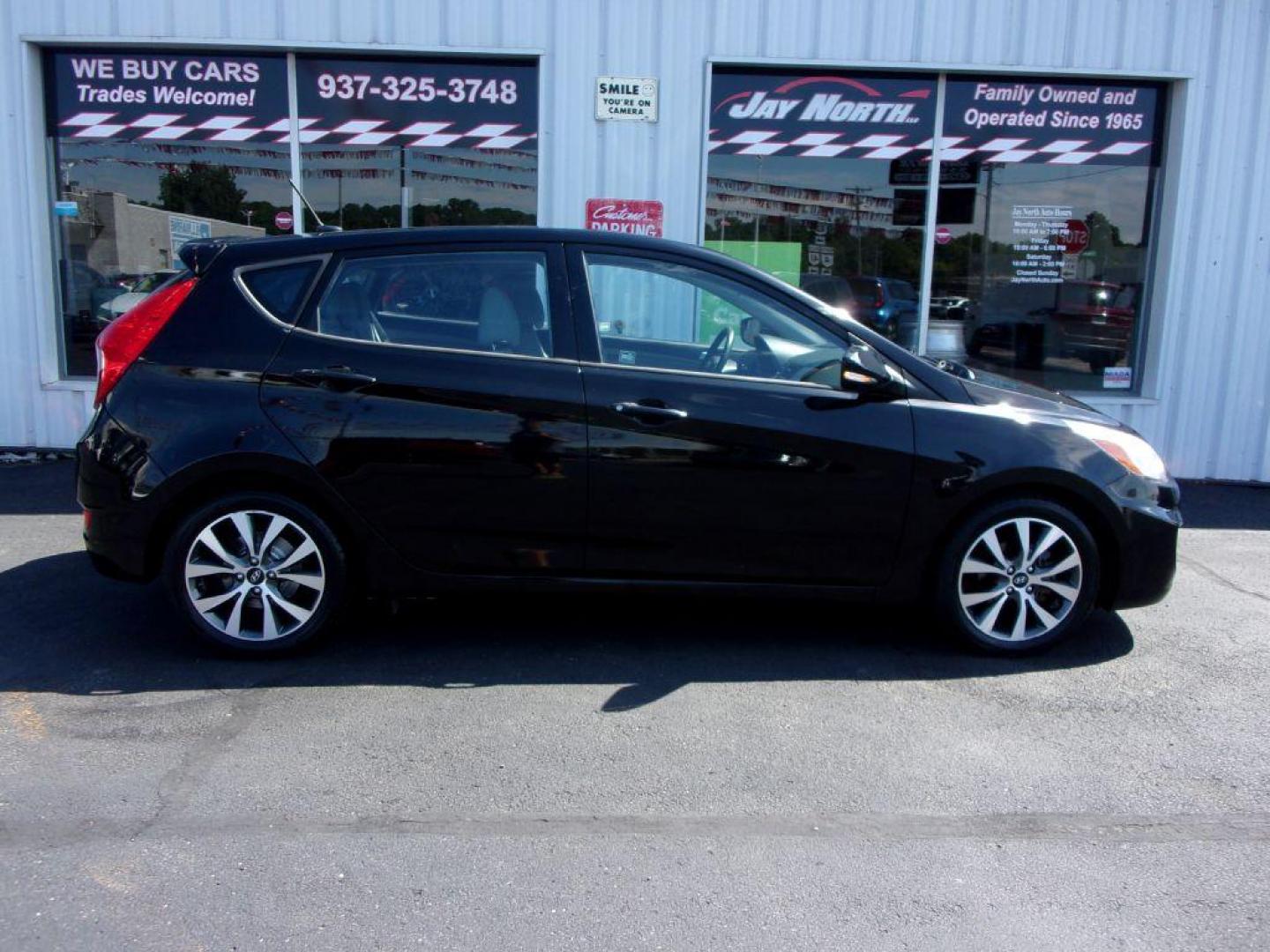 2015 BLACK HYUNDAI ACCENT SPORT (KMHCU5AE5FU) with an 1.6L engine, Automatic transmission, located at 501 E. Columbia St., Springfield, OH, 45503, (800) 262-7122, 39.925262, -83.801796 - ***SPORT***New Tires***Sunroof***Serviced and Detailed*** Jay North Auto has offered hand picked vehicles since 1965! Our customer's enjoy a NO pressure buying experience with a small town feel. All of our vehicles get fully inspected and detailed. We are a preferred dealer for many local credit - Photo#0