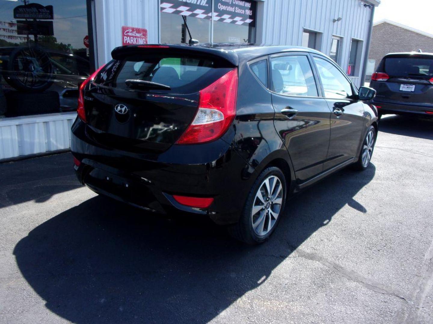 2015 BLACK HYUNDAI ACCENT SPORT (KMHCU5AE5FU) with an 1.6L engine, Automatic transmission, located at 501 E. Columbia St., Springfield, OH, 45503, (800) 262-7122, 39.925262, -83.801796 - ***SPORT***New Tires***Sunroof***Serviced and Detailed*** Jay North Auto has offered hand picked vehicles since 1965! Our customer's enjoy a NO pressure buying experience with a small town feel. All of our vehicles get fully inspected and detailed. We are a preferred dealer for many local credit - Photo#3