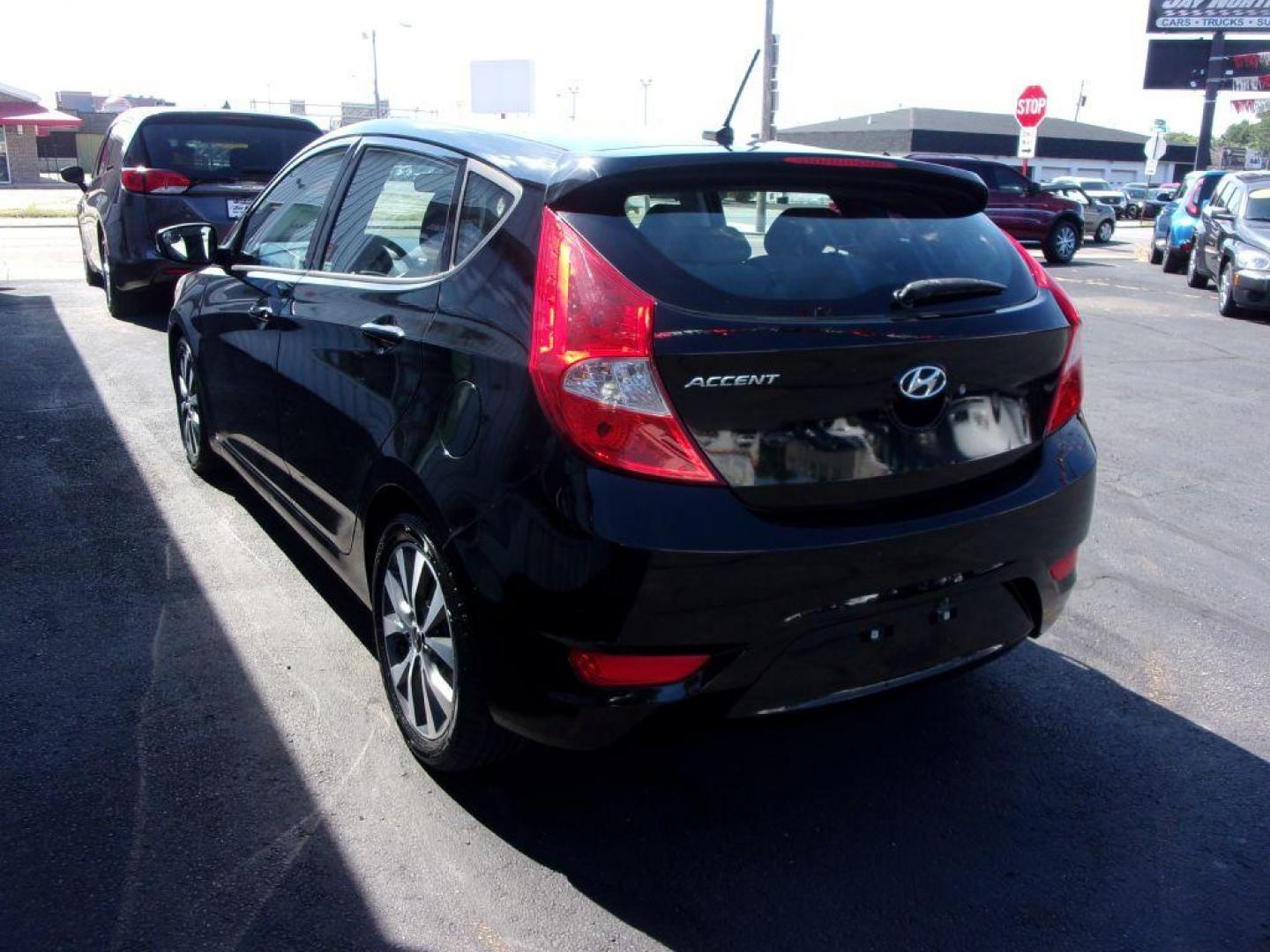 2015 BLACK HYUNDAI ACCENT SPORT (KMHCU5AE5FU) with an 1.6L engine, Automatic transmission, located at 501 E. Columbia St., Springfield, OH, 45503, (800) 262-7122, 39.925262, -83.801796 - ***SPORT***New Tires***Sunroof***Serviced and Detailed*** Jay North Auto has offered hand picked vehicles since 1965! Our customer's enjoy a NO pressure buying experience with a small town feel. All of our vehicles get fully inspected and detailed. We are a preferred dealer for many local credit - Photo#5