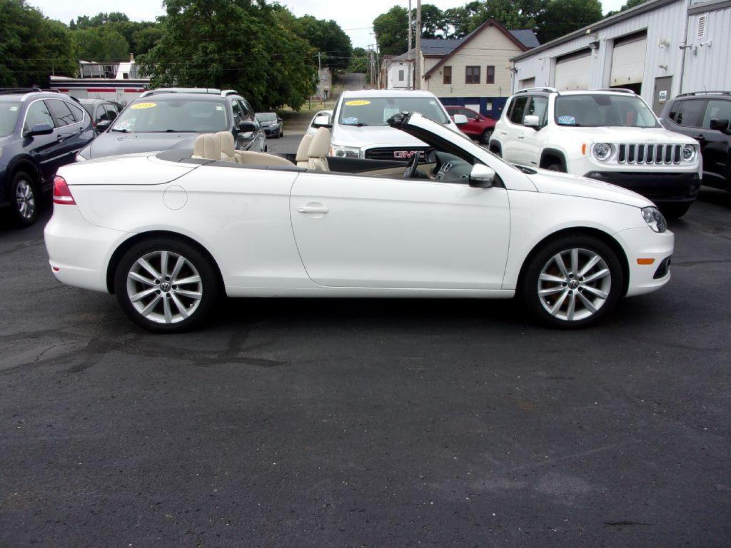 2014 WHITE VOLKSWAGEN EOS KOMFORT (WVWBW8AH5EV) with an 2.0L engine, Automatic transmission, located at 501 E. Columbia St., Springfield, OH, 45503, (800) 262-7122, 39.925262, -83.801796 - ***Clean Carfax***Convertible***EOS Komfort***Heated Leather Seating***Serviced and Detailed*** Jay North Auto has offered hand picked vehicles since 1965! Our customer's enjoy a NO pressure buying experience with a small town feel. All of our vehicles get fully inspected and detailed. We are a - Photo#0