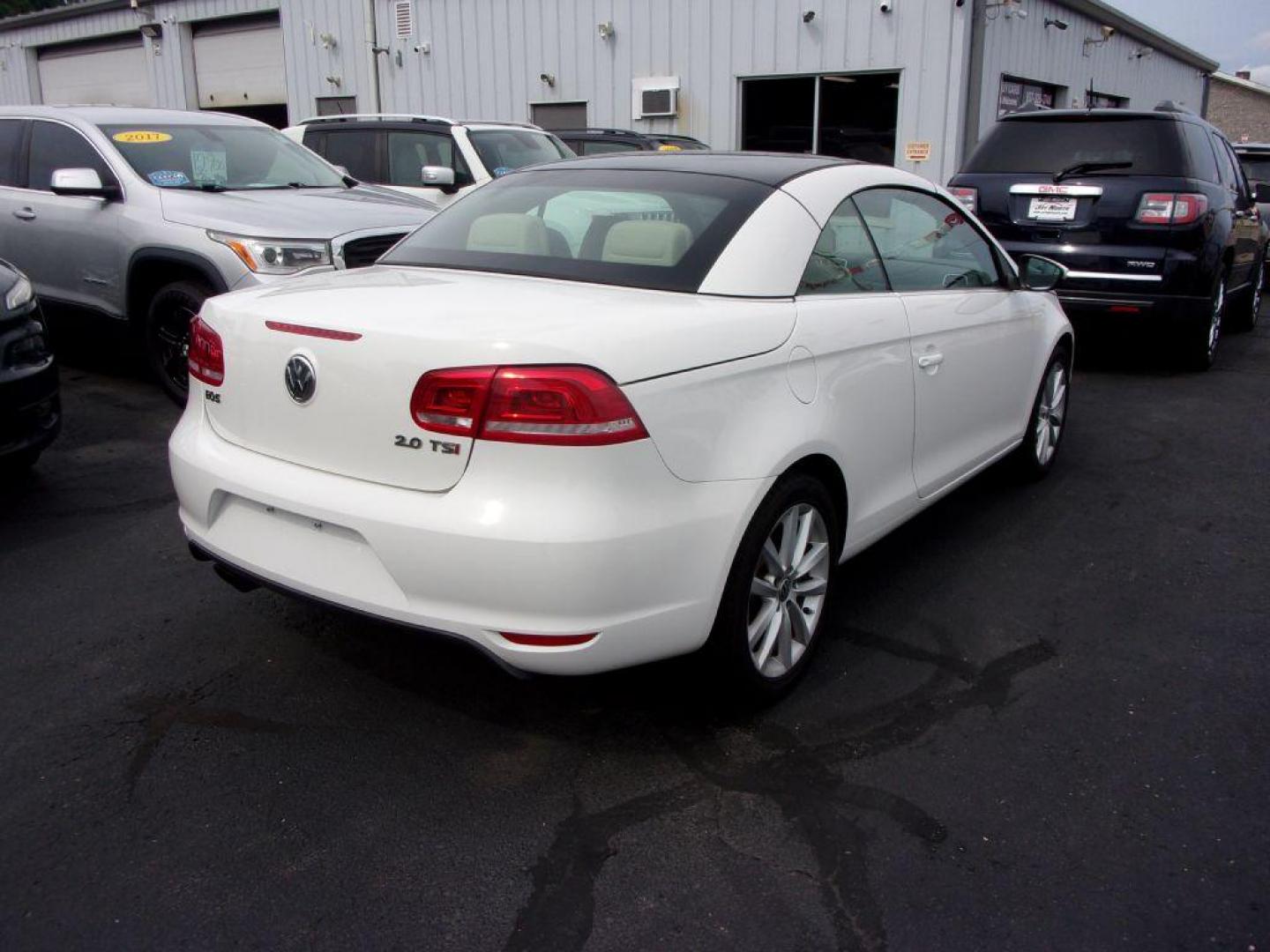 2014 WHITE VOLKSWAGEN EOS KOMFORT (WVWBW8AH5EV) with an 2.0L engine, Automatic transmission, located at 501 E. Columbia St., Springfield, OH, 45503, (800) 262-7122, 39.925262, -83.801796 - ***Clean Carfax***Convertible***EOS Komfort***Heated Leather Seating***Serviced and Detailed*** Jay North Auto has offered hand picked vehicles since 1965! Our customer's enjoy a NO pressure buying experience with a small town feel. All of our vehicles get fully inspected and detailed. We are a - Photo#9