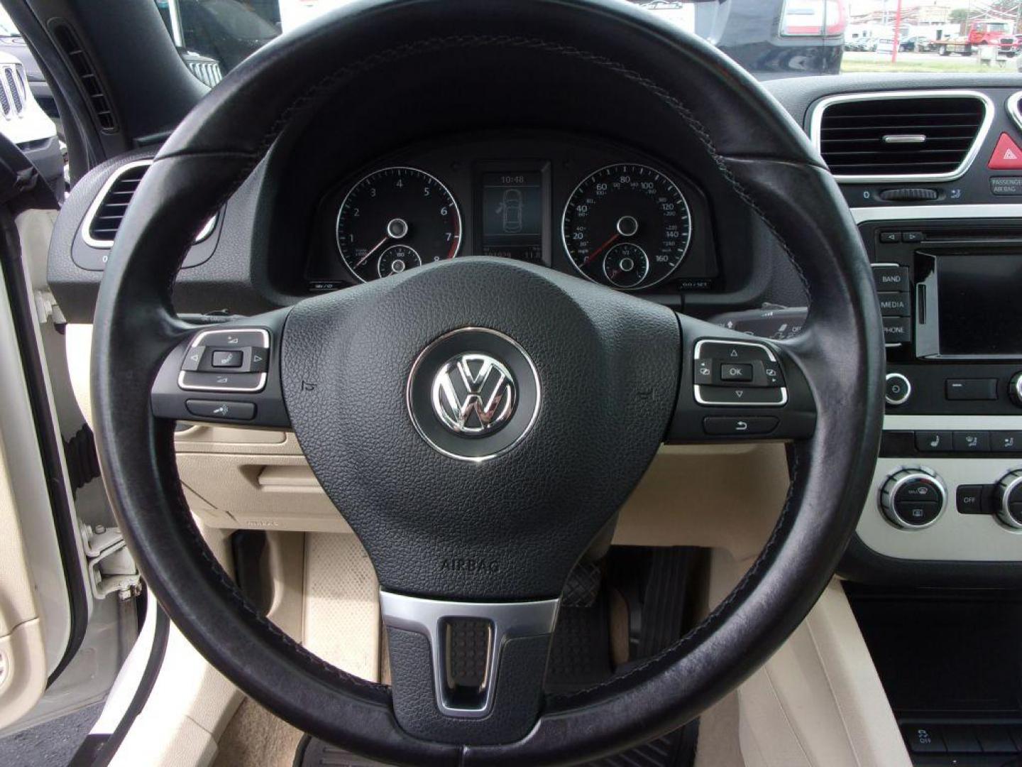 2014 WHITE VOLKSWAGEN EOS KOMFORT (WVWBW8AH5EV) with an 2.0L engine, Automatic transmission, located at 501 E. Columbia St., Springfield, OH, 45503, (800) 262-7122, 39.925262, -83.801796 - ***Clean Carfax***Convertible***EOS Komfort***Heated Leather Seating***Serviced and Detailed*** Jay North Auto has offered hand picked vehicles since 1965! Our customer's enjoy a NO pressure buying experience with a small town feel. All of our vehicles get fully inspected and detailed. We are a - Photo#13