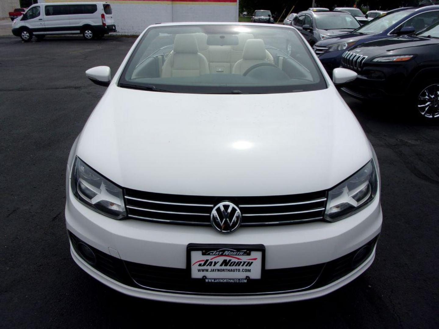 2014 WHITE VOLKSWAGEN EOS KOMFORT (WVWBW8AH5EV) with an 2.0L engine, Automatic transmission, located at 501 E. Columbia St., Springfield, OH, 45503, (800) 262-7122, 39.925262, -83.801796 - ***Clean Carfax***Convertible***EOS Komfort***Heated Leather Seating***Serviced and Detailed*** Jay North Auto has offered hand picked vehicles since 1965! Our customer's enjoy a NO pressure buying experience with a small town feel. All of our vehicles get fully inspected and detailed. We are a - Photo#1