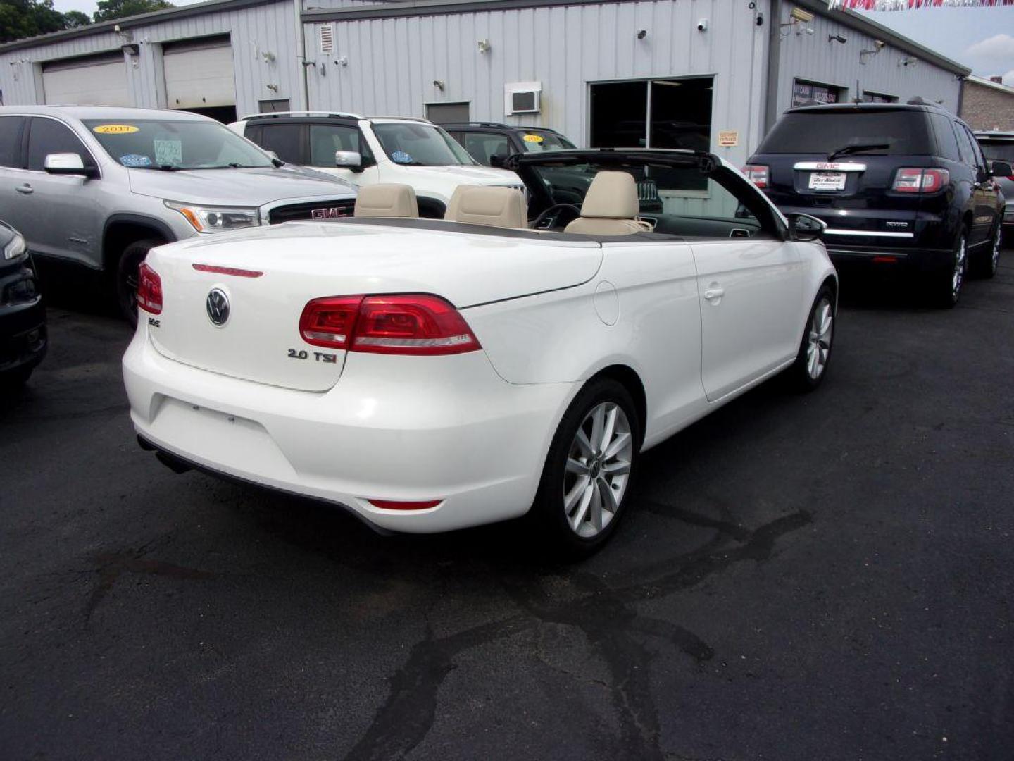 2014 WHITE VOLKSWAGEN EOS KOMFORT (WVWBW8AH5EV) with an 2.0L engine, Automatic transmission, located at 501 E. Columbia St., Springfield, OH, 45503, (800) 262-7122, 39.925262, -83.801796 - ***Clean Carfax***Convertible***EOS Komfort***Heated Leather Seating***Serviced and Detailed*** Jay North Auto has offered hand picked vehicles since 1965! Our customer's enjoy a NO pressure buying experience with a small town feel. All of our vehicles get fully inspected and detailed. We are a - Photo#3