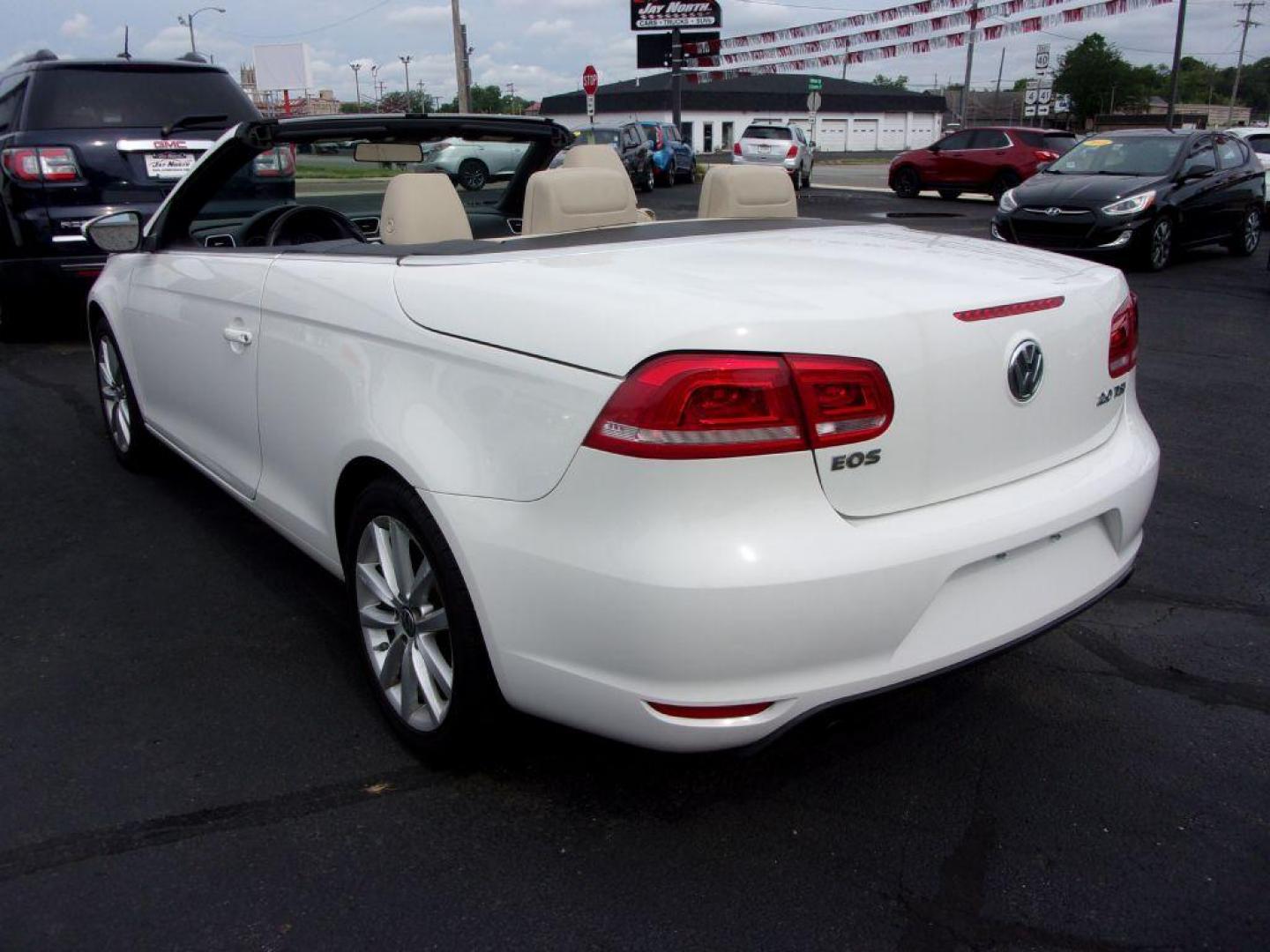 2014 WHITE VOLKSWAGEN EOS KOMFORT (WVWBW8AH5EV) with an 2.0L engine, Automatic transmission, located at 501 E. Columbia St., Springfield, OH, 45503, (800) 262-7122, 39.925262, -83.801796 - ***Clean Carfax***Convertible***EOS Komfort***Heated Leather Seating***Serviced and Detailed*** Jay North Auto has offered hand picked vehicles since 1965! Our customer's enjoy a NO pressure buying experience with a small town feel. All of our vehicles get fully inspected and detailed. We are a - Photo#5